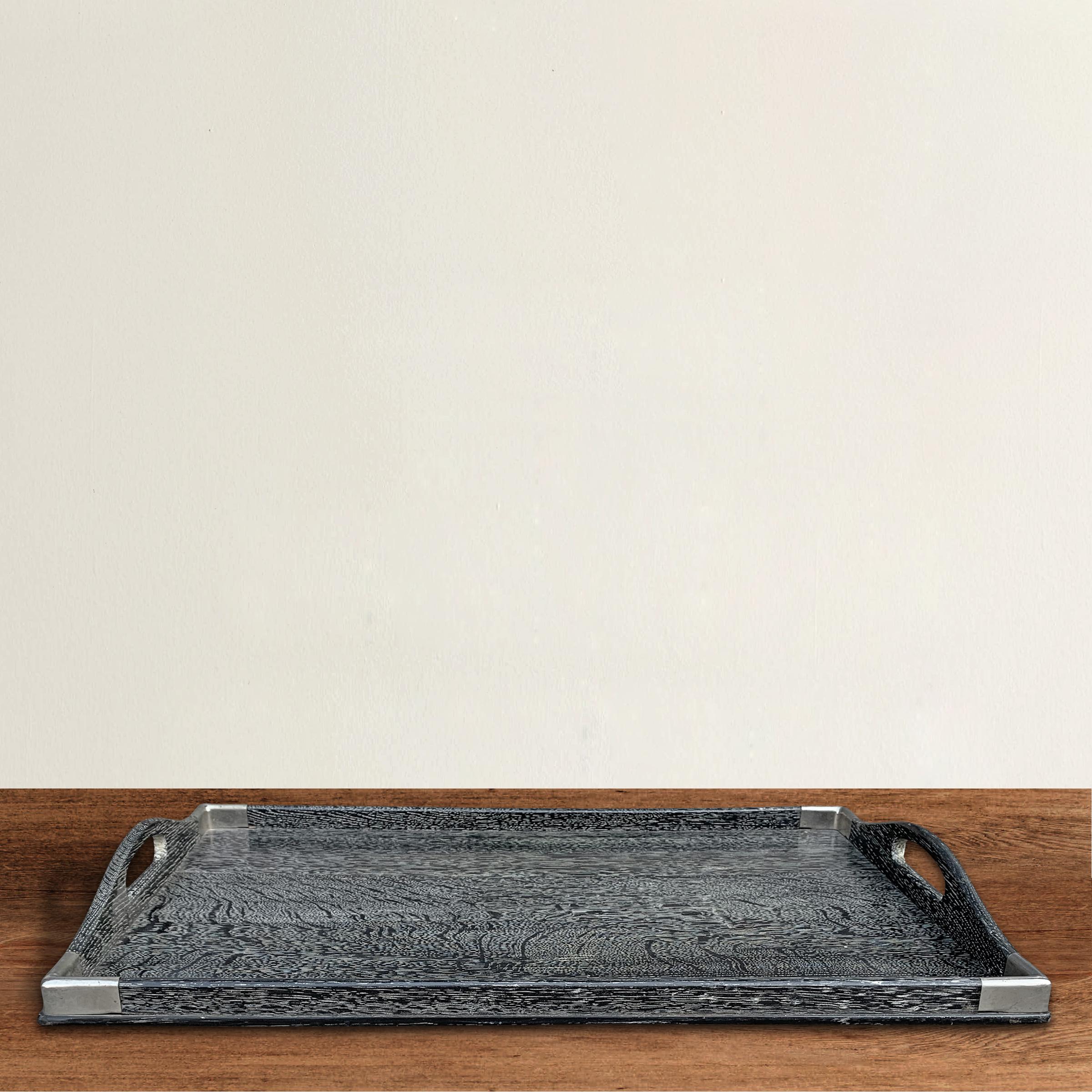 A fantastic mid-20th century black stained and Cerused rift oak tray with silver plated corner mounts. Perfect for a coffee table, breakfast in bed, or in your bathroom to hold myriad things.