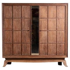 Zweitüriger Schrank aus keramischer Eiche mit Spiegel, Manier of Jaques Adnet, Frankreich, 1940er Jahre