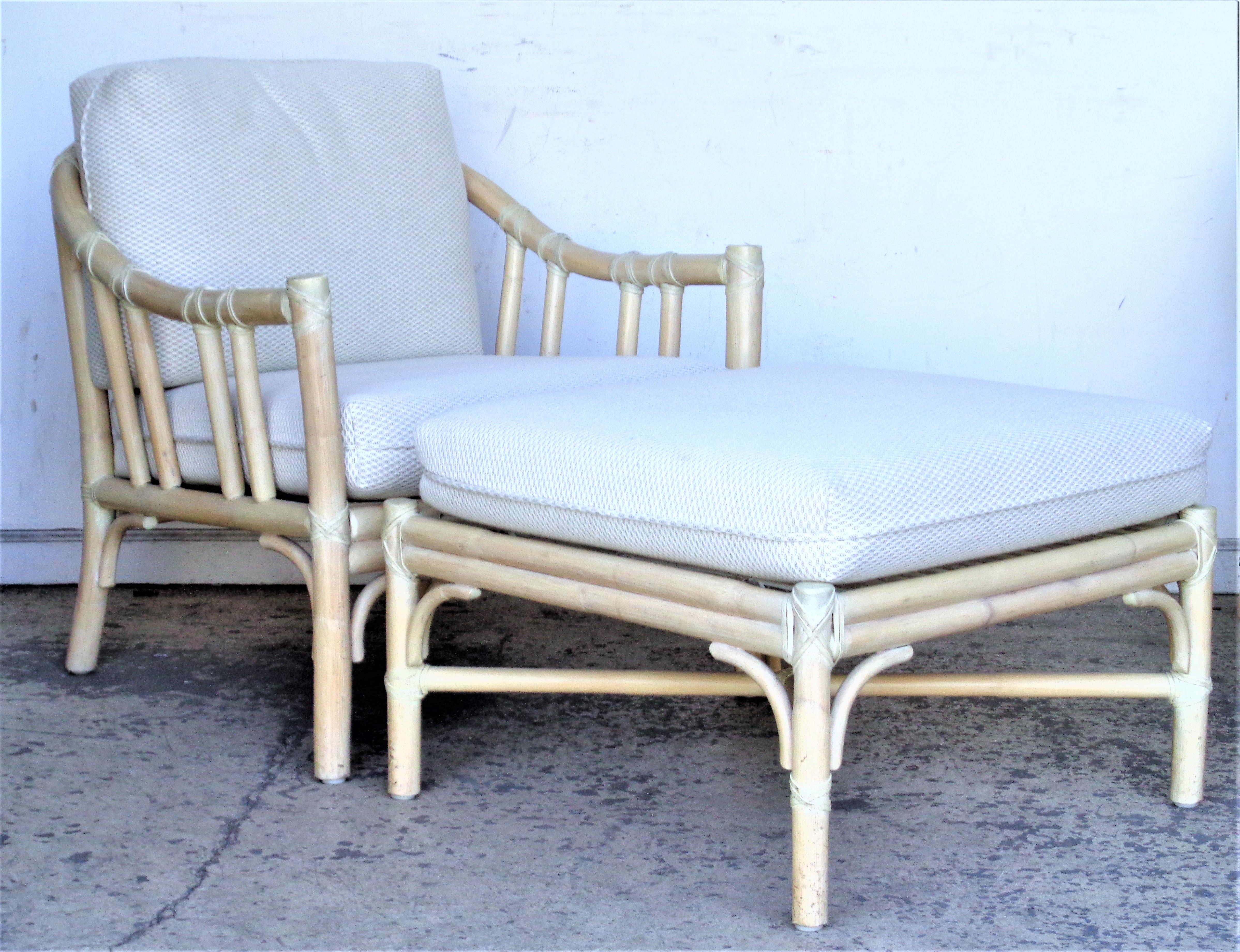 California organic modern style pair of large rattan and leather rawhide wrapped matching lounge chairs and ottoman in the original cerused factory finish by McGuire, San Francisco. The chairs with the original Made in Denmark Rotex rubber straps.