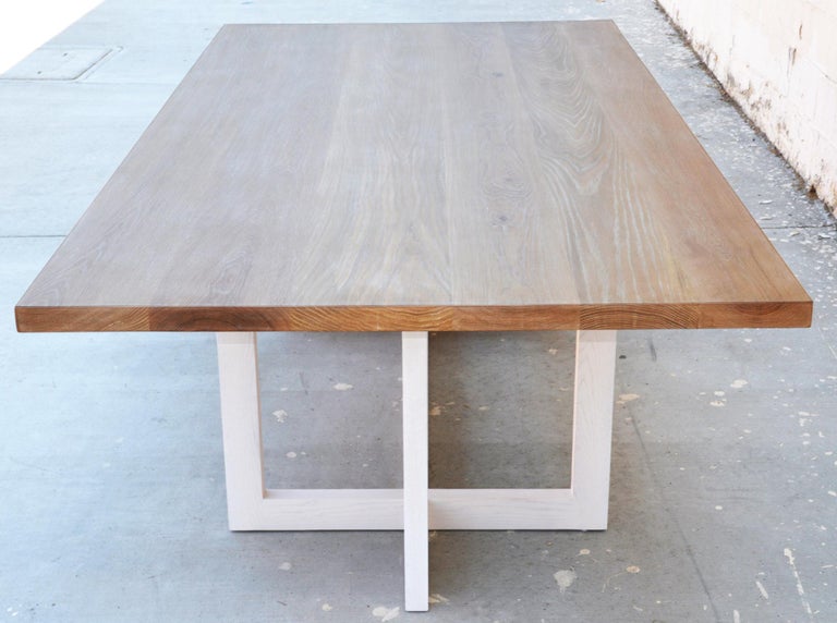 This custom dining table is made from solid, rift-sawn white oak with a 
