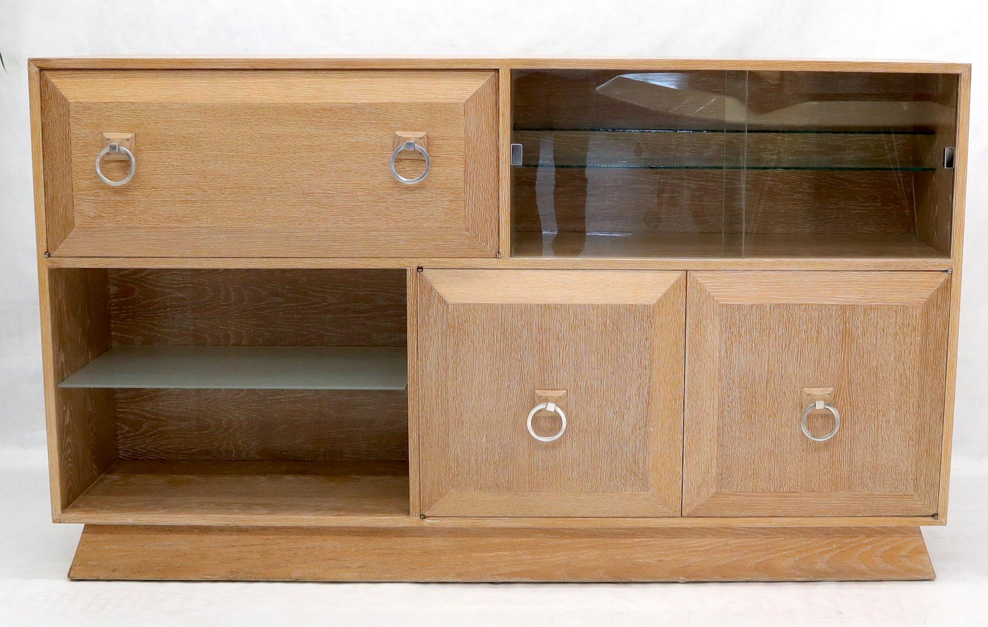 Multi use limed oak credenza with built in drop front secretary. Beautiful large and heavy circular ring shape hardware.