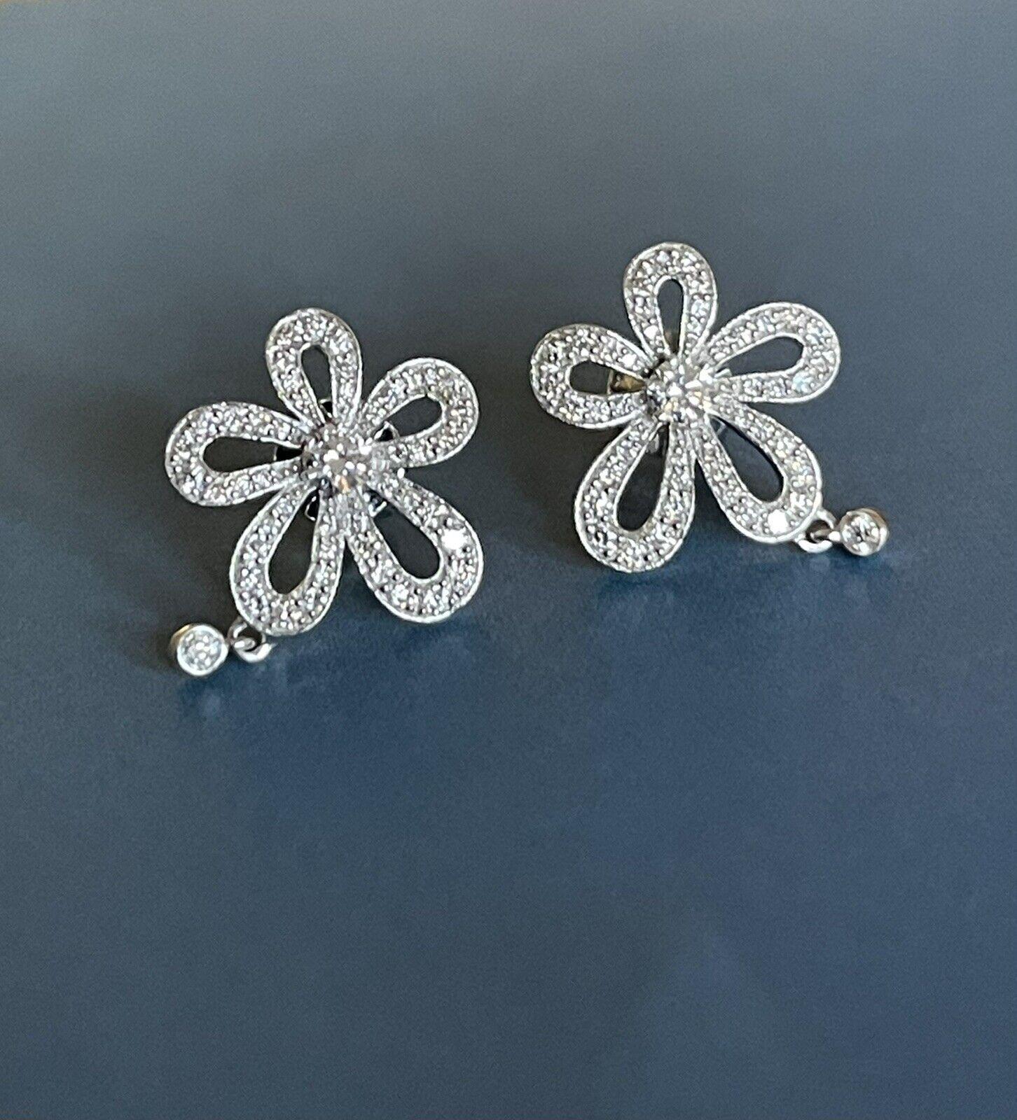 Cervin Blanc 18ct White Gold Diamond Earrings 0.64ct Plumeria Flower Solitaire In New Condition For Sale In Ilford, GB