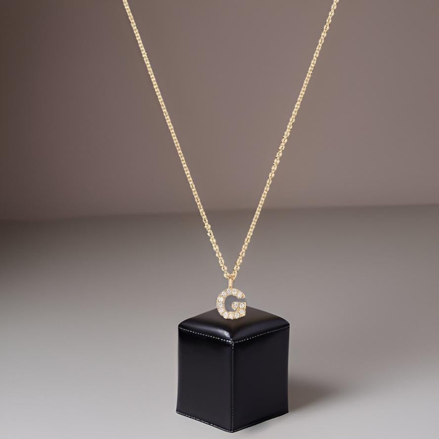 DIAMOND INITIAL NECKLACE

18CT Y/G H SI2

Weight: 1.4g