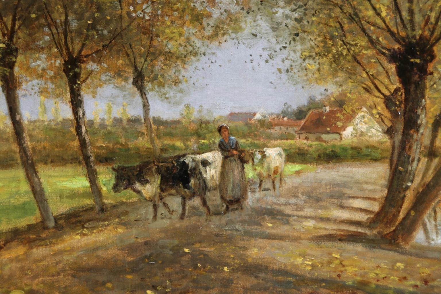 Oil on original canvas by French Barbizon painter Cesar De Cock, depicting a woman herding her cattle along a village path in a autumnal landscape scene. Signed and dated 1886 lower right. Framed dimensions are 28 inches high by 34 inches