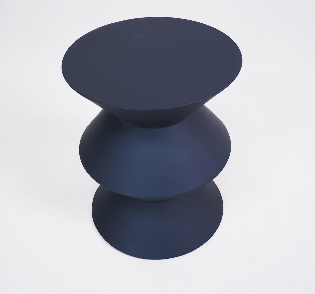Sculptural stool / side table designed by Rodolfo Dordoni and produced by Minotti. Refinished in a matt dark grey.

Dimensions (cm, approx): 
Height: 45
Diameter: 36

Fair condition with surface imperfections