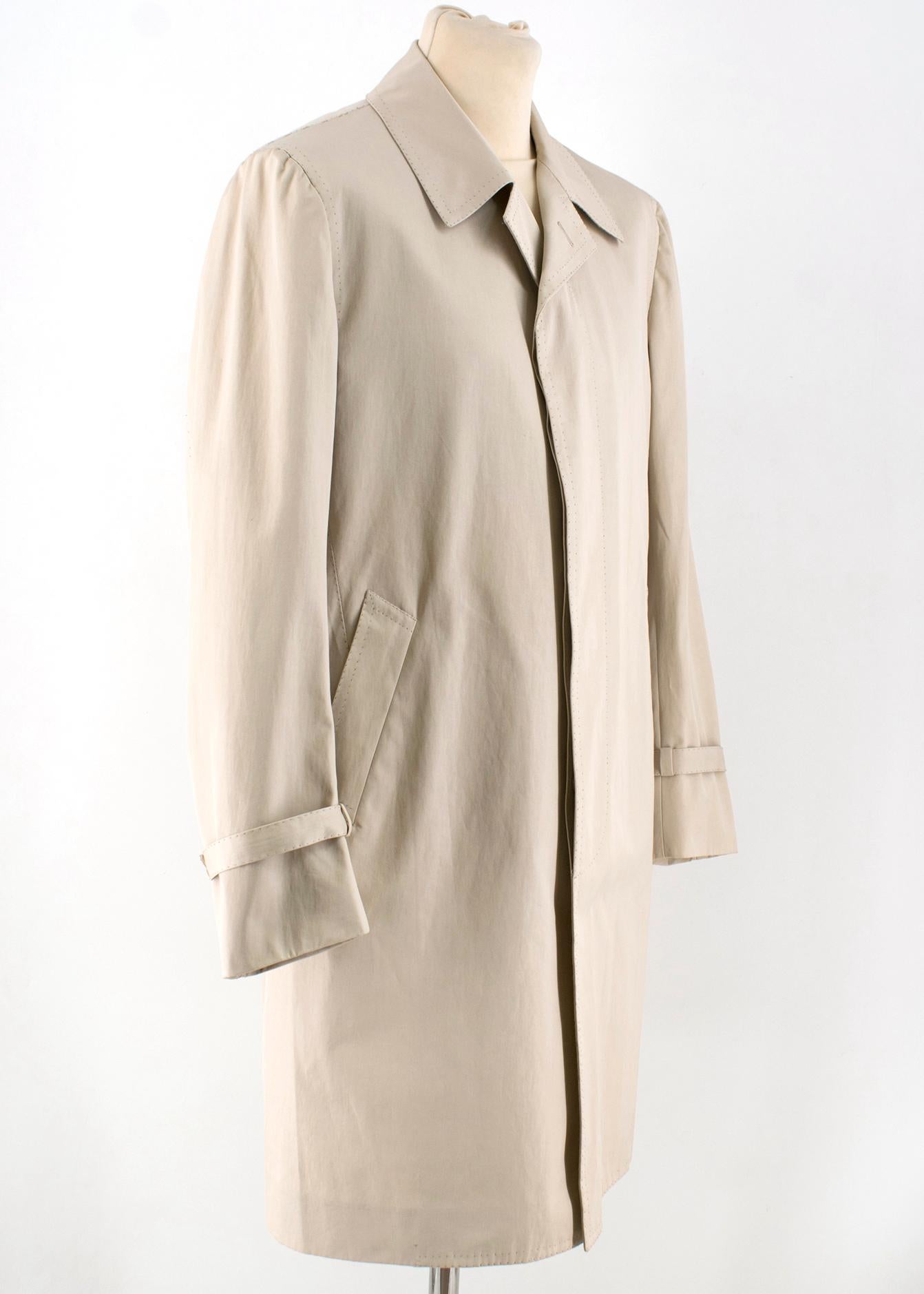 Cesare Attolini Beige Cotton Trench Coat

- Beige cotton trench coat
- Lightweight
- Slightly padded shoulders
- Notch lapels
- Long sleeved, belted cuffs
- Centre-front concealed buttons fastening
- Front side pockets
- Internal two pockets
- 100%