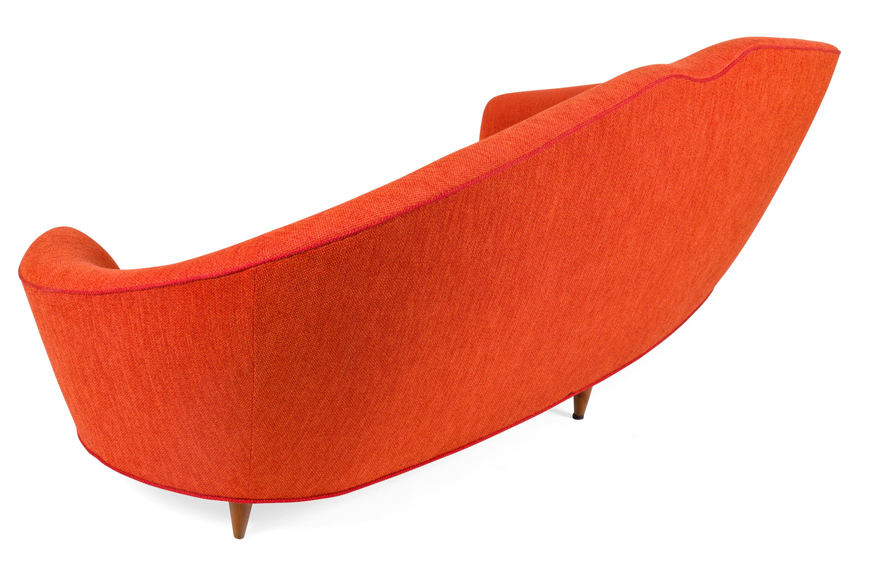 curved orange sofa