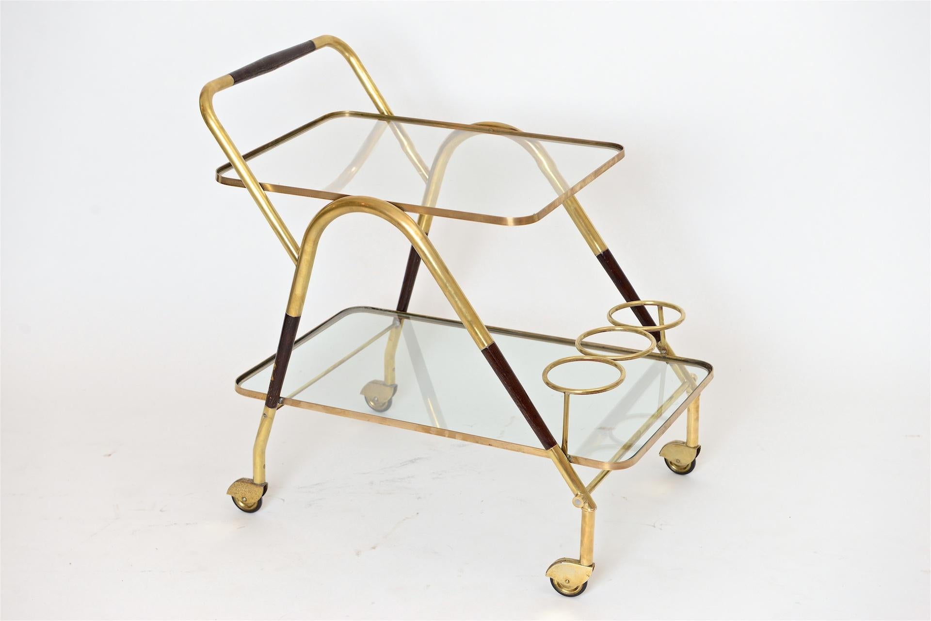 Nice example of Cesare Lacca bar trolley in wood and brass, Italy, circa 1950.
 