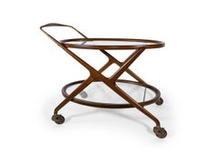 Cesare Lacca Italian Mid-Century Oval Darkened Teak and Brass Serving Trolley