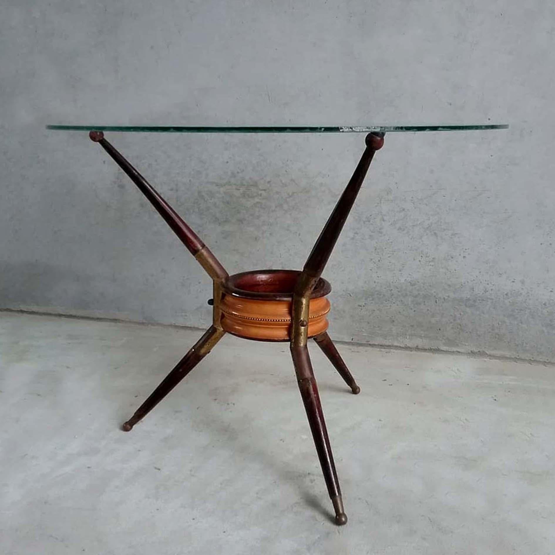 Midcentury mahogany and brass center, cocktail or coffee table designed by Cesare Lacca in 1950s.
The blurred glass top can be substituted by clear glass top on request.