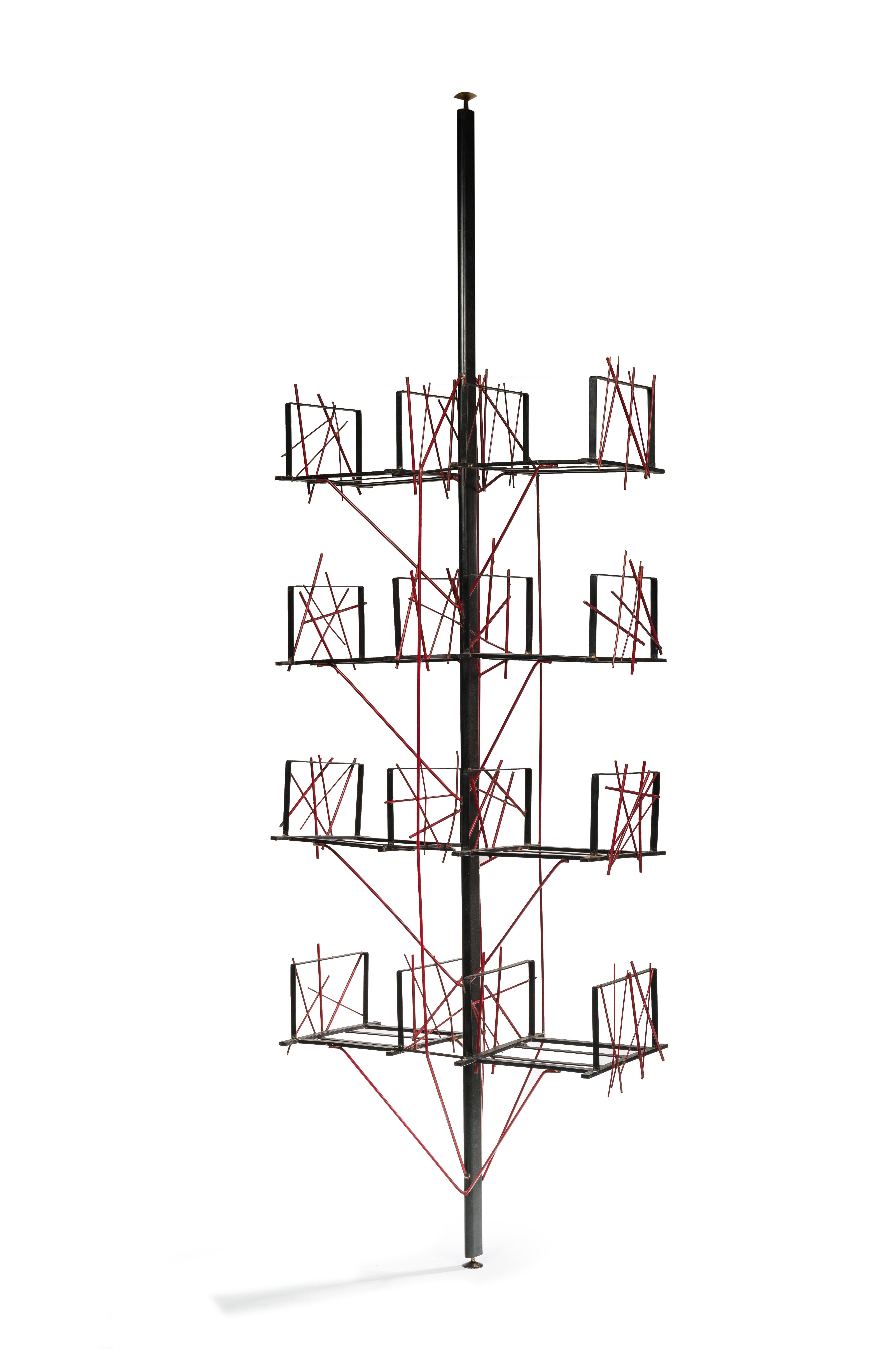 Cesare Lazzarini, 1931-2010
Shelf-sculpture, unique piece 1956.
Four double shelves in black painted welded flat bars hang on either side of the ovoid tube central pivot.
Short round irons painted in red are welded to the ends of the shelves,
