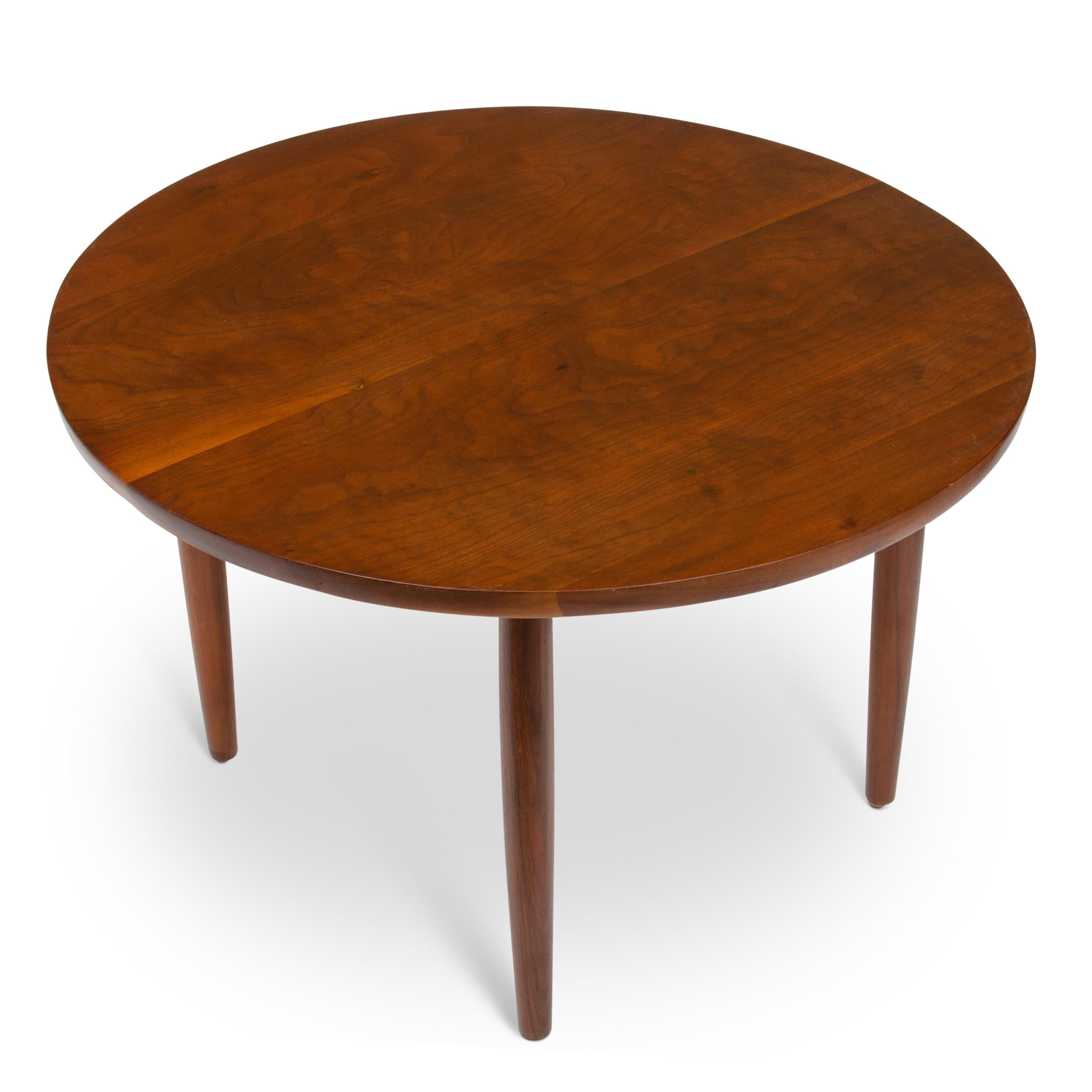 An unsigned round walnut coffee table by Cesare Occhi (New Hope School). Purchased directly from the estate of a relative of Mr. Occhi in Bucks County Pa. Cesare Occhi apprenticed with George Nakashima and the quality of his work and relationship to