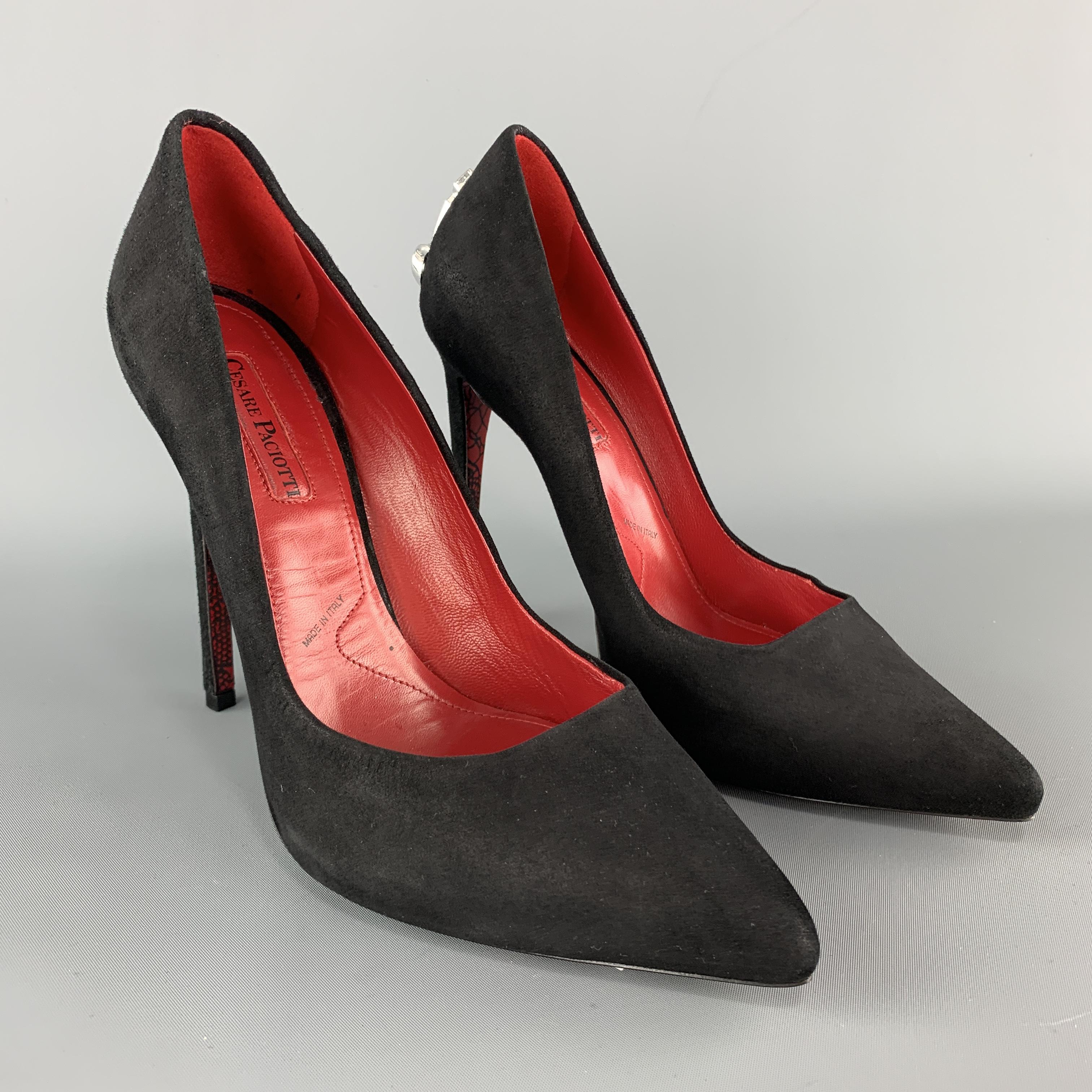 Black CESARE PACIOTTI pumps come in black suede with a pointed toe and silver tone swo