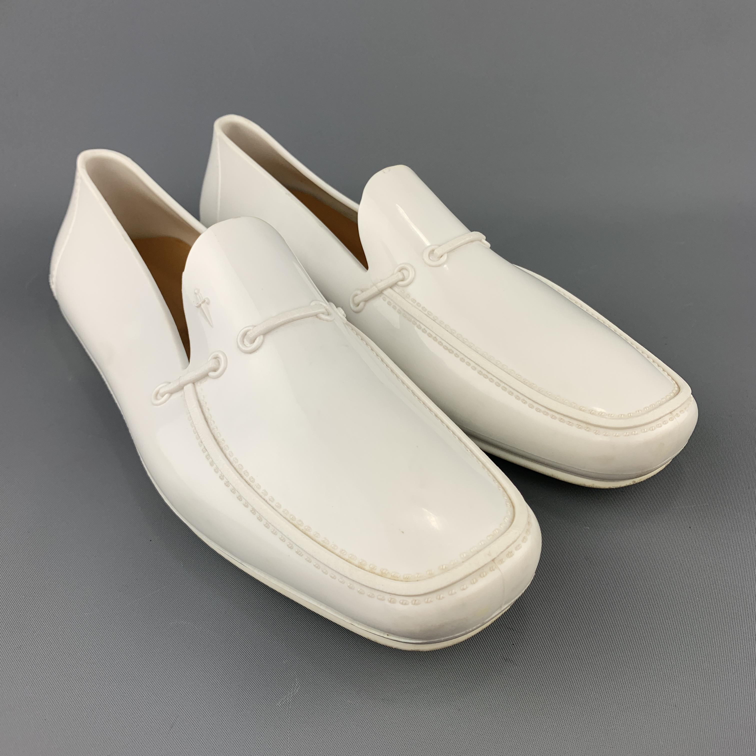 CESARE PACIOTTI loafers come in white rubber with an apron toe, mock woven accent and dagger logo. . Minor wear. Made in Italy.
 
Good Pre-Owned Condition.
Marked: (no size)
 
Outsole: 11.75 x 4 in.