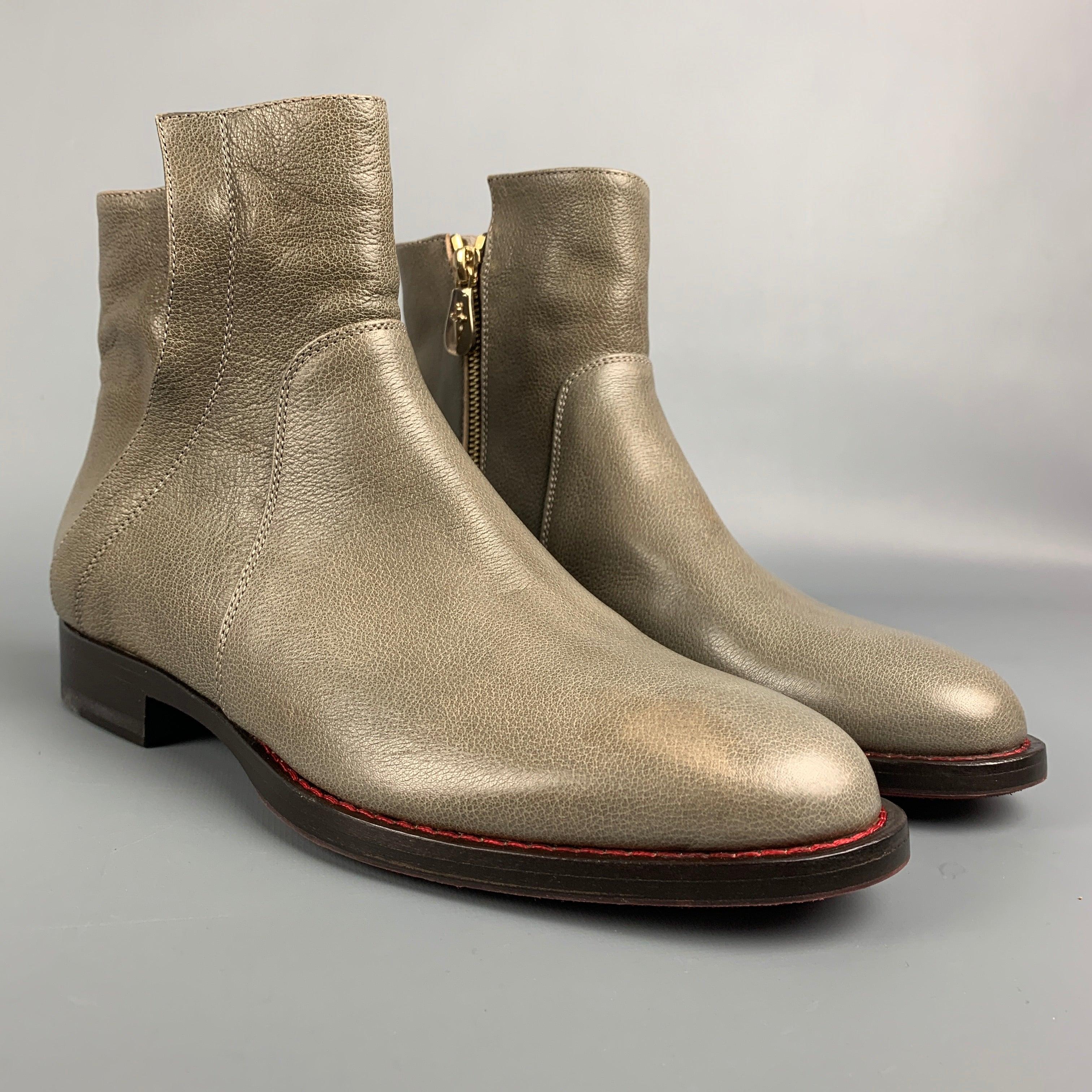 CESARE PACIOTTI ankle boots comes in a taupe pebble grain leather featuring red interior, rubber sole, and a double zipper closure. Made in Italy.
New With Box.
 

Marked:   38.5 

Measurements: 
  Length:
10.5 inches  Width: 3.5 inches  Height: 5