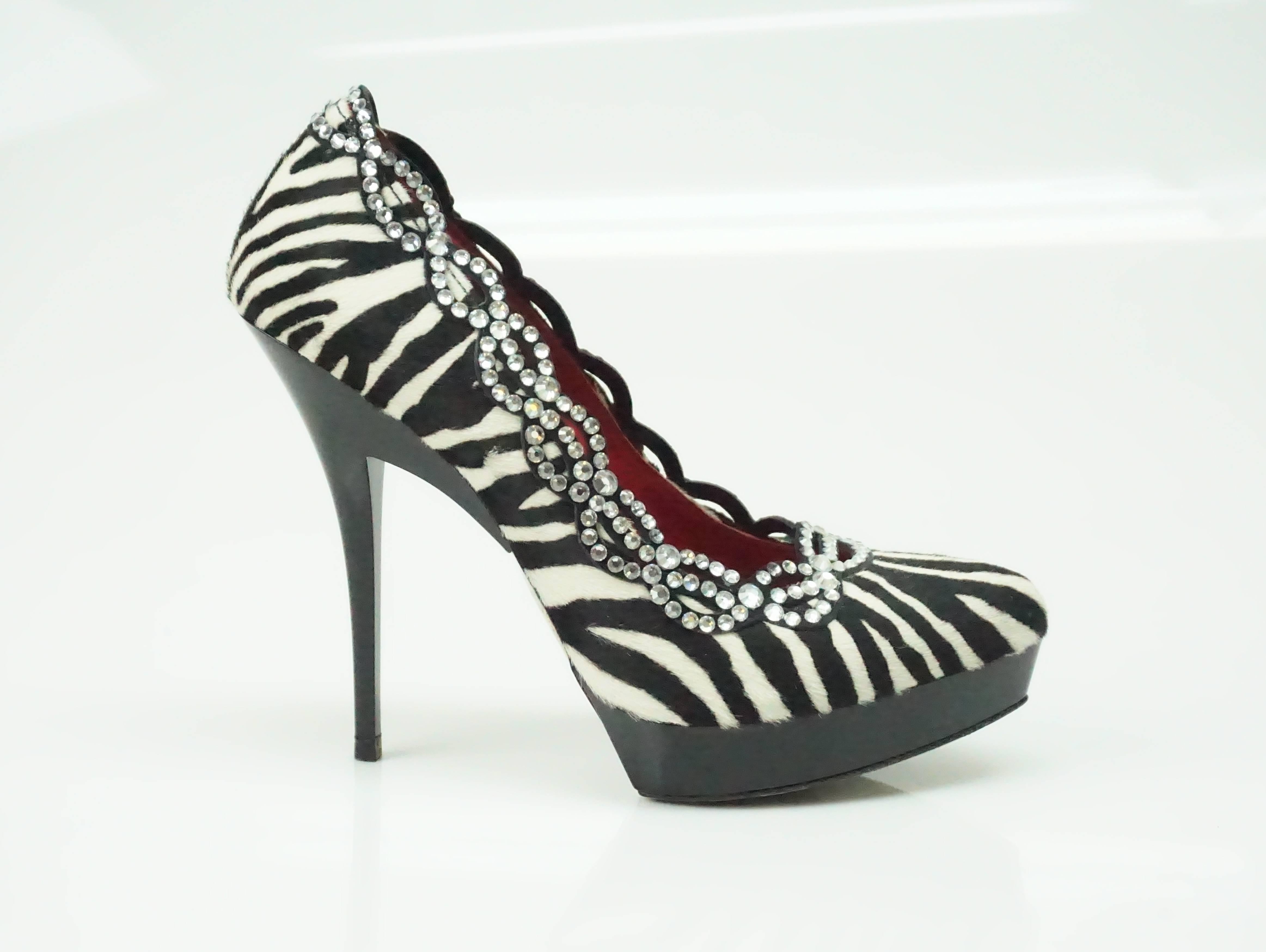 Cesare Paciotti Zebra Pony Hair Platform Pumps w/ Swarovski Detailing - 37  These vibrant heels are in excellent condition. There are barely any scuffs or marks and were hardly ever used. The heel is 5