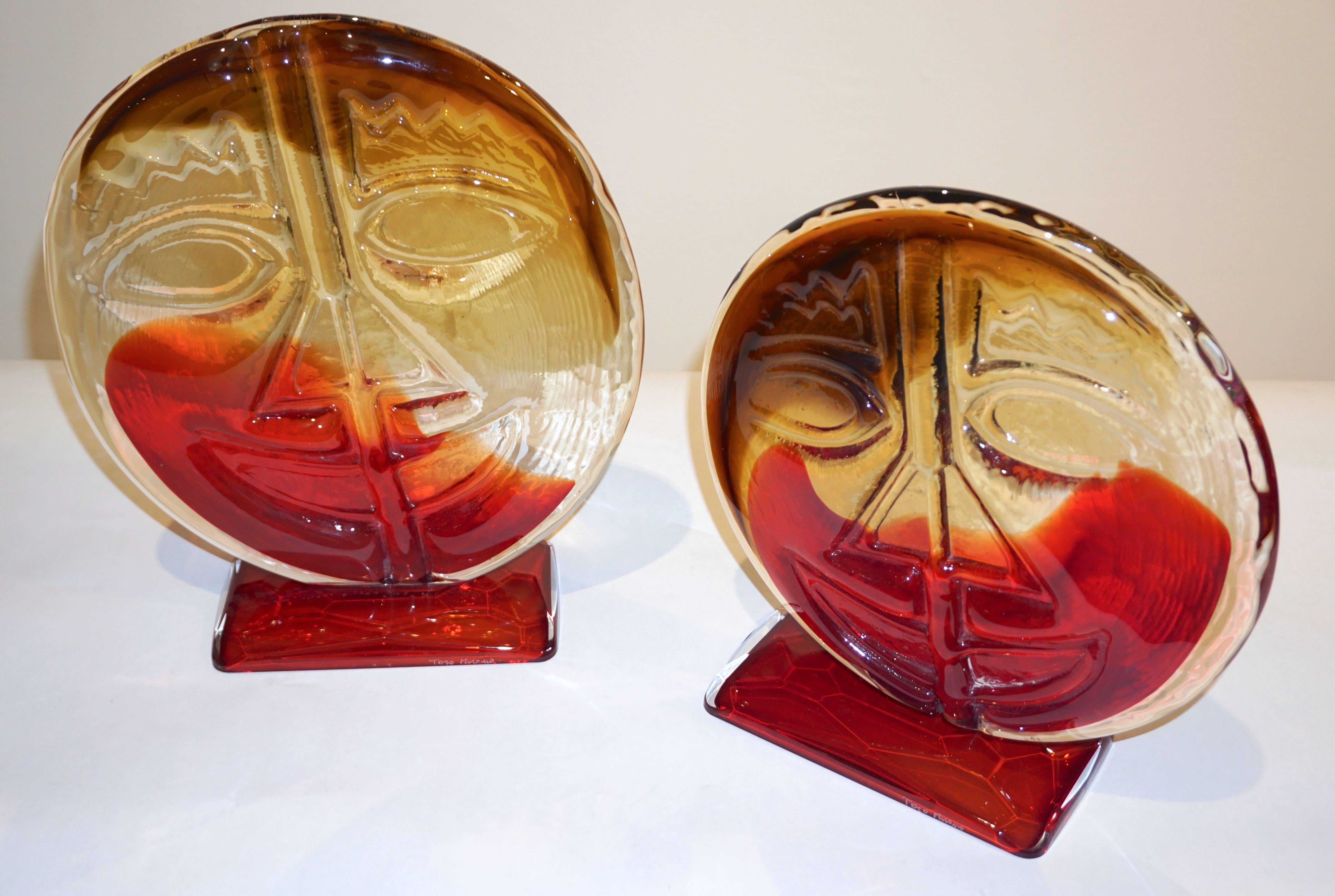 These fun Picasso style Italian decorative faces in Murano Art glass present high quality of Design and execution, the crystal clear Murano glass is worked with bursts of red and yellow, amber colors, the front decorated with an abstract cubist