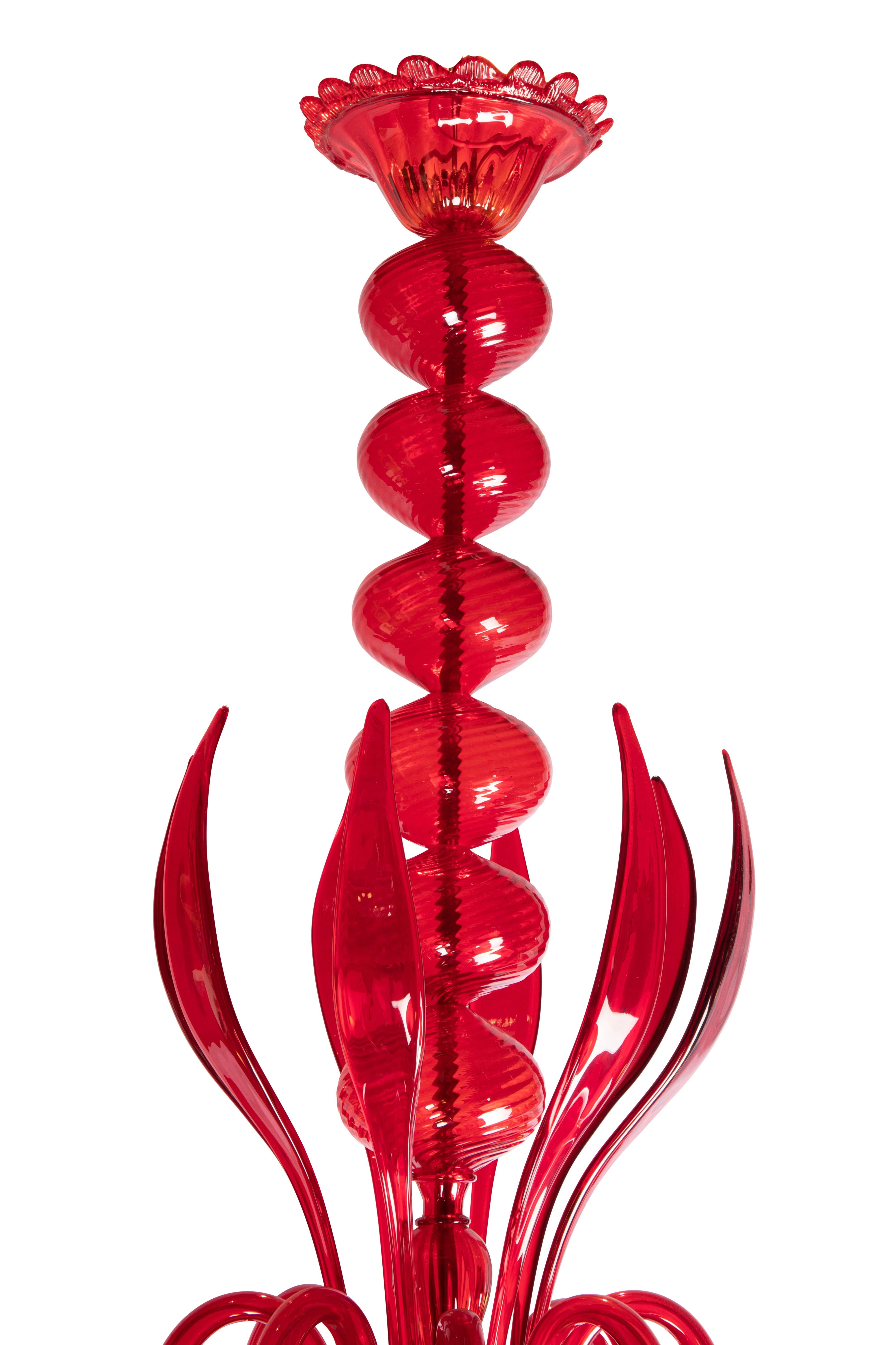 Red blown glass chalice chandelier by Cesare Toso, Murano.

Cesare Toso is a famed artisanal art glass company.

The chandelier has 8 arms and lights, is in perfect condition and dates from the 1980’s.

The balls forming the body of the column