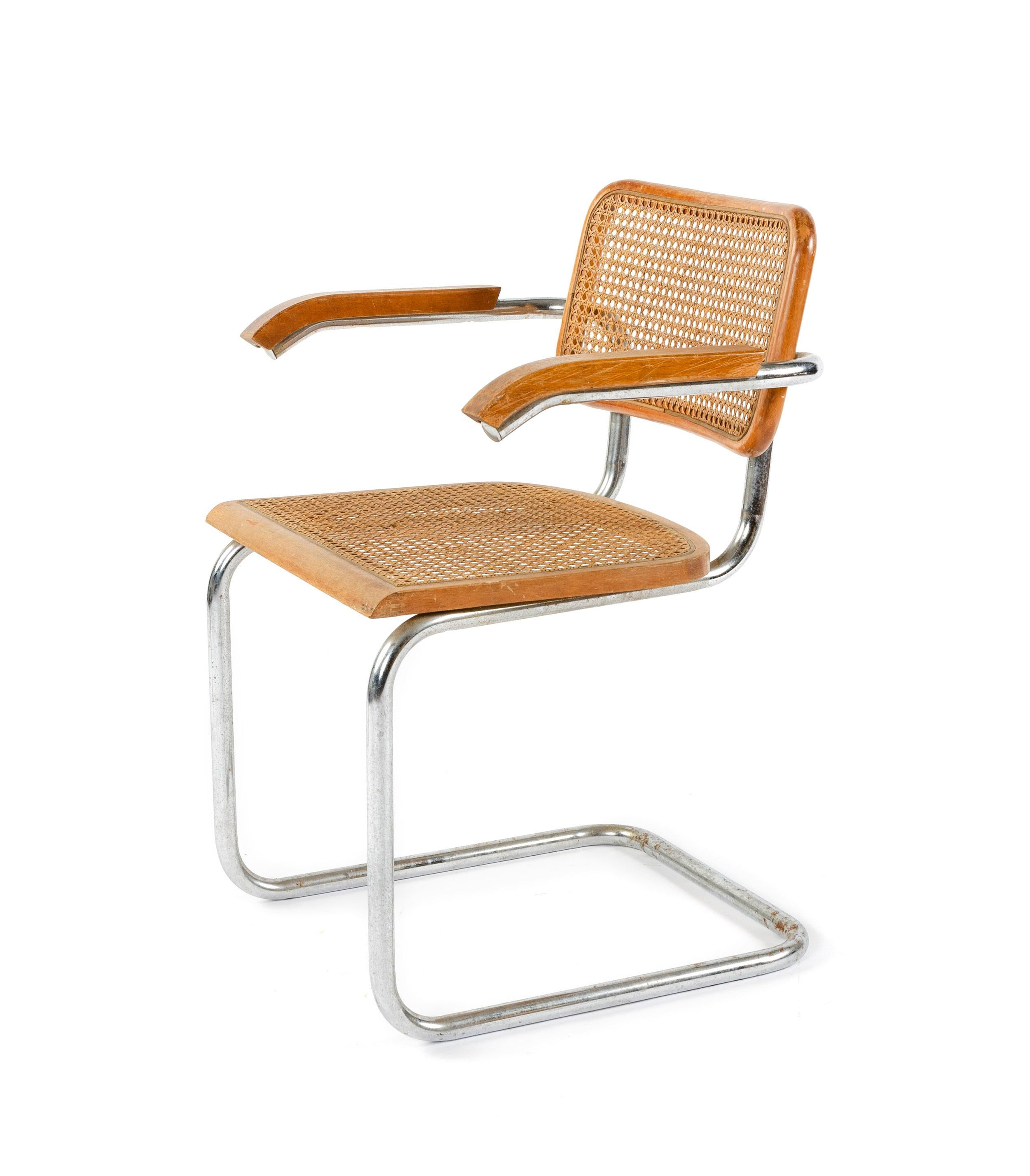 A minimal Cesca armchair designed by Marcel Breuer featuring caned seat and back on a cantilevered tubular chrome frame. Originally from the Levy House in Princeton, NJ, designed by Marcel Breuer, circa 1953. 
