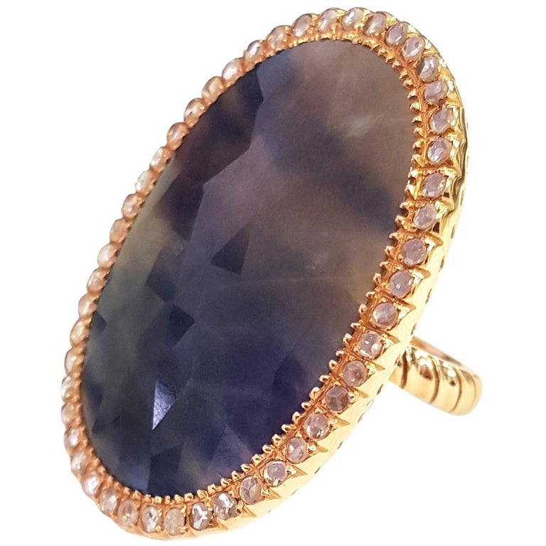 A 25.80-carat blue sapphire framed by rose-cut diamonds and set in 18-karat rose gold.

An objet d'art, the ring is captivating from every angle. Handmade in the FANCS V studio and using the 