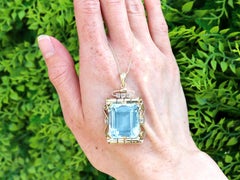 C'est Laudier 32.20 Carat Aquamarine 0.10 Carat Diamond 14k Yellow Gold Pendant