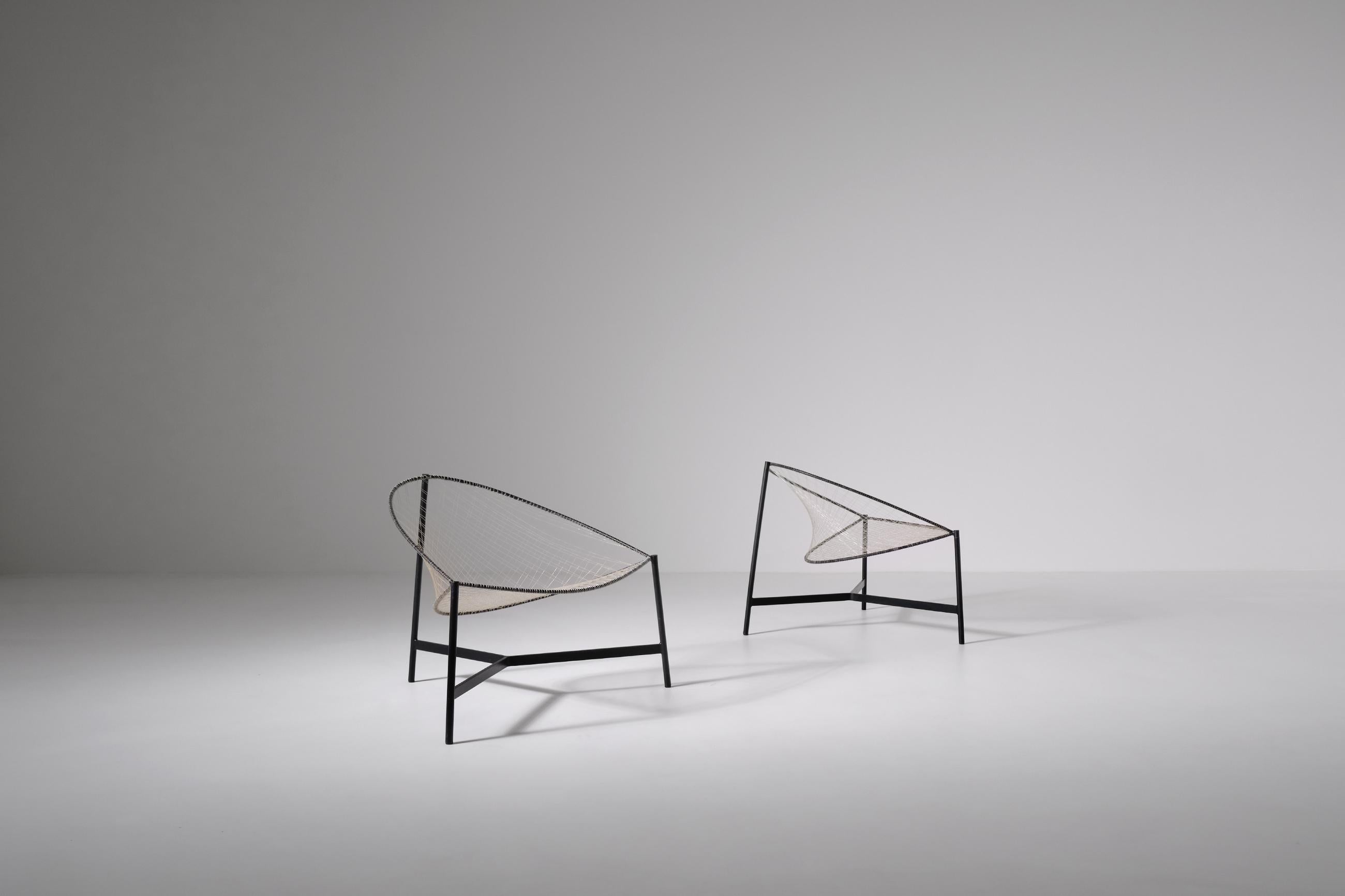 Rare pair of 'Cesto' chairs by Luciano Grassi, Sergio Conti and Marisa Forlani by Emilio Paoli, Italy ca. 1959. The chairs are from the 'Monofilo' series. The design is the result of experimenting with new materials and the simplification and