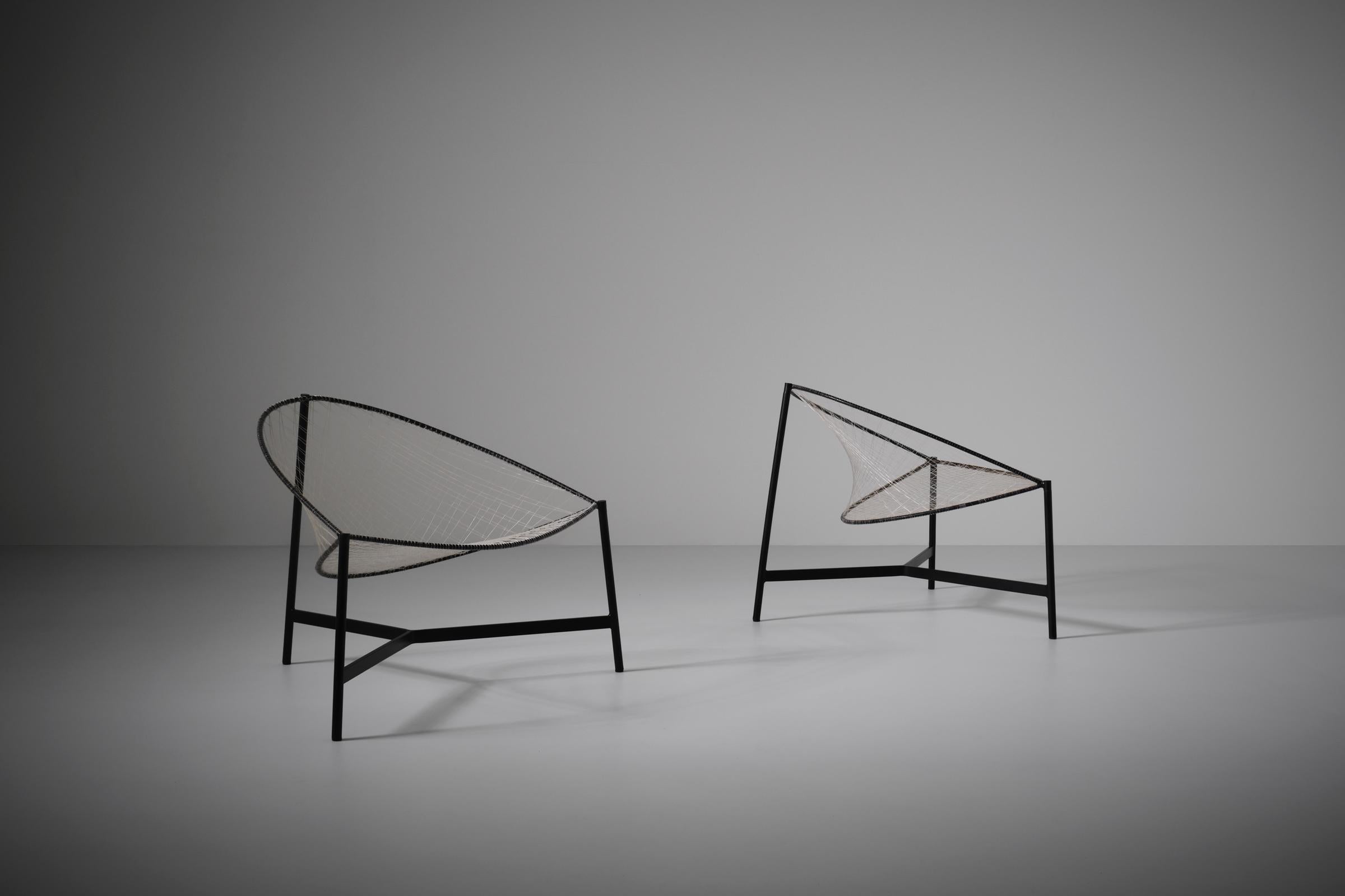 Rare pair of 'Cesto' chairs by Luciano Grassi, Sergio Conti and Marisa Forlani by Emilio Paoli, Italy circa. 1959. The chairs are from the 'Monofilo' series. The design is the result of experimenting with new materials and the simplification and