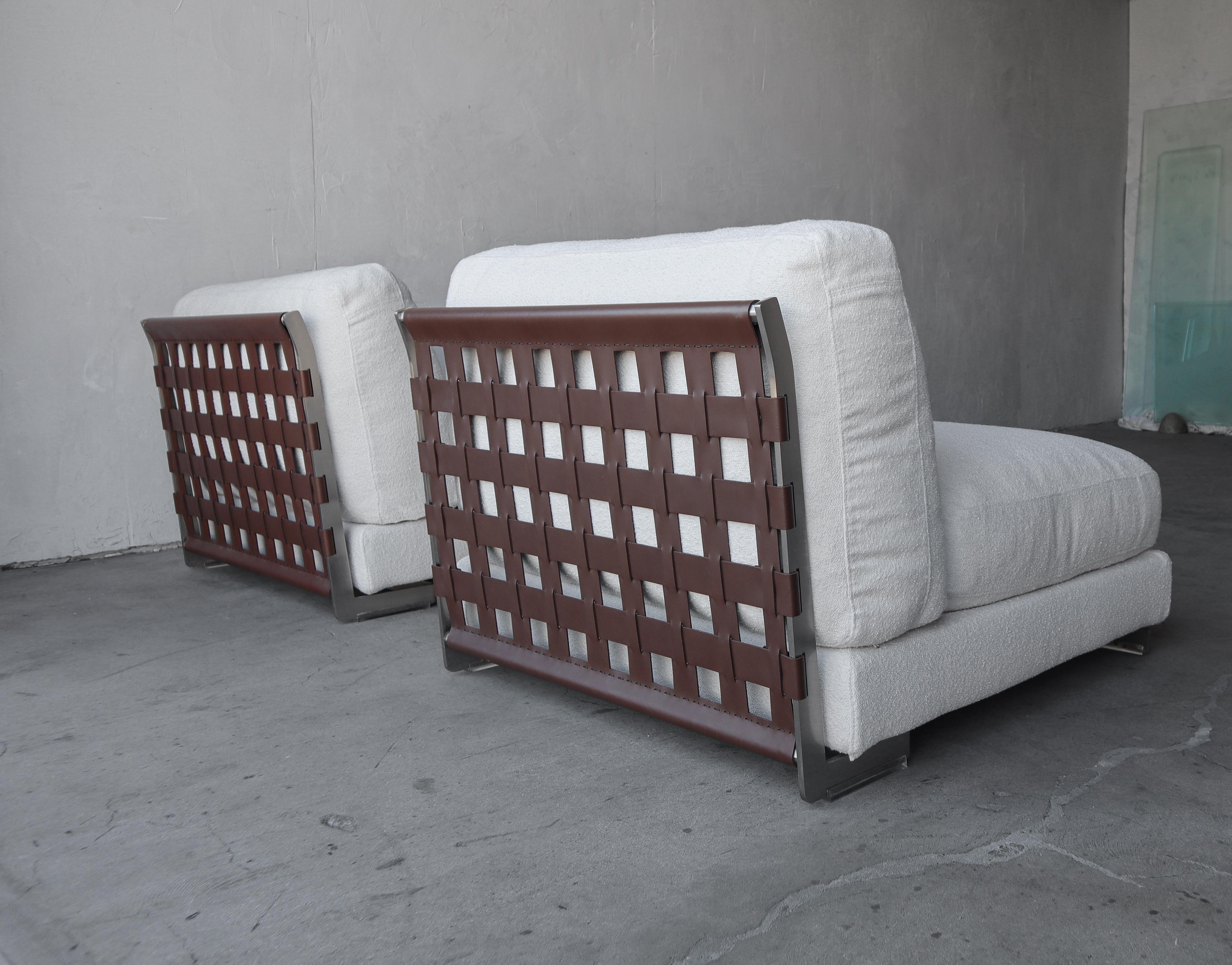 A lovely set of 4 armless, modular Cestone Lounge Chairs, design in 2008 by Antonio Citterio for Flexform, an embodiment of authentic Italian craftsmanship in both form and function. 

The satin finish metal frames, paired with the chocolate woven