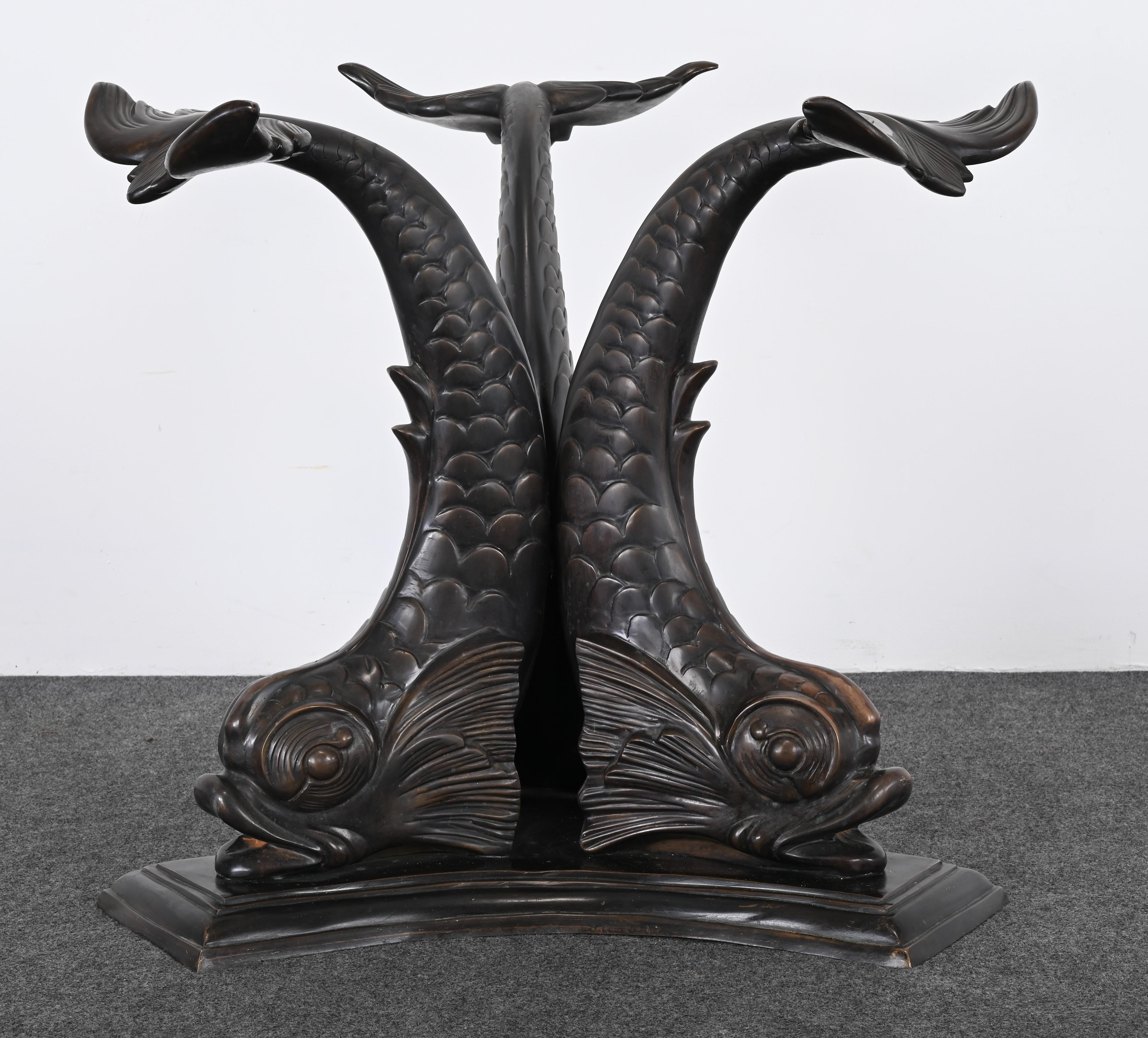 A fabulous bronze center table or dining table by Maitland Smith. The company is known for creating exquisite and unique decorative accessories, lighting, and accent furniture. This table would work well in any traditional or contemporary setting.