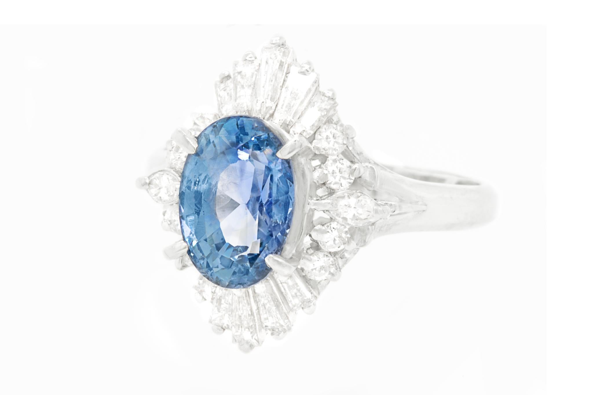 Oval Cut Ceylon 2.95 Carat Sapphire Ring Set With Diamonds 0.80 Carats Total Platinum For Sale