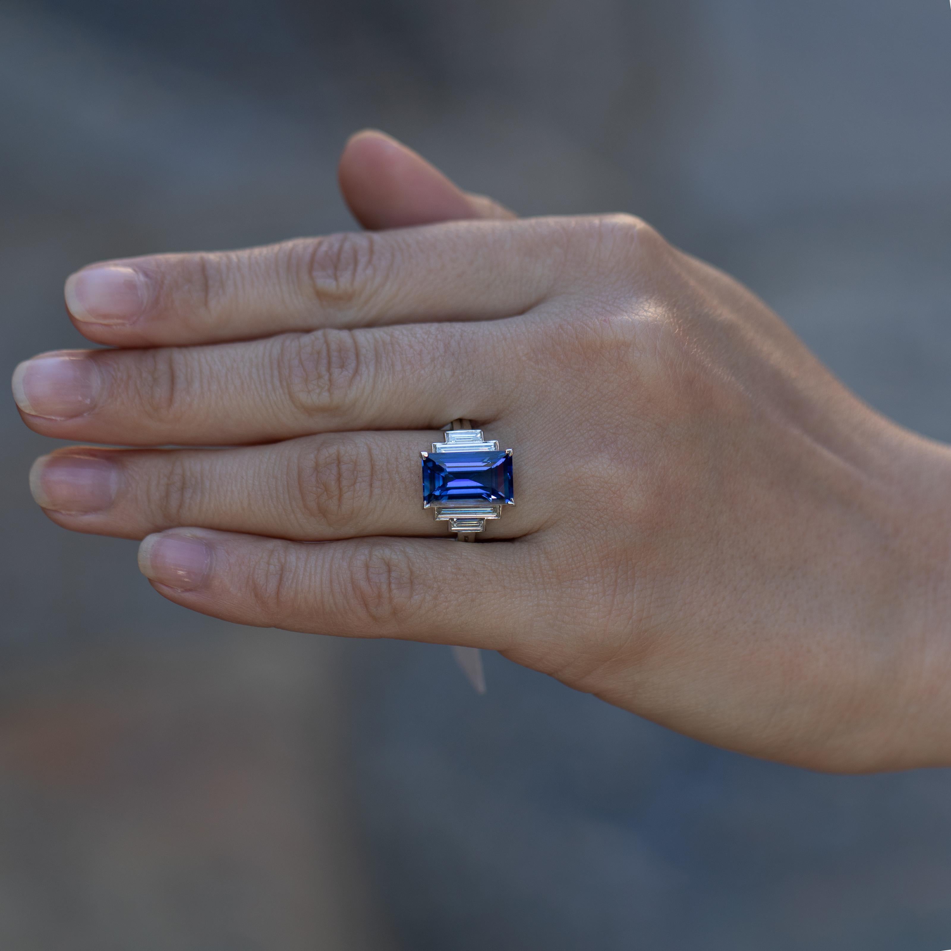 This is a once in a lifetime gemstone. I have been in the trade all of my life and this is by far the most beautiful sapphire I have ever laid my eyes on. It is so chique and bold. I love the long shape of the stone and the art deco design with the