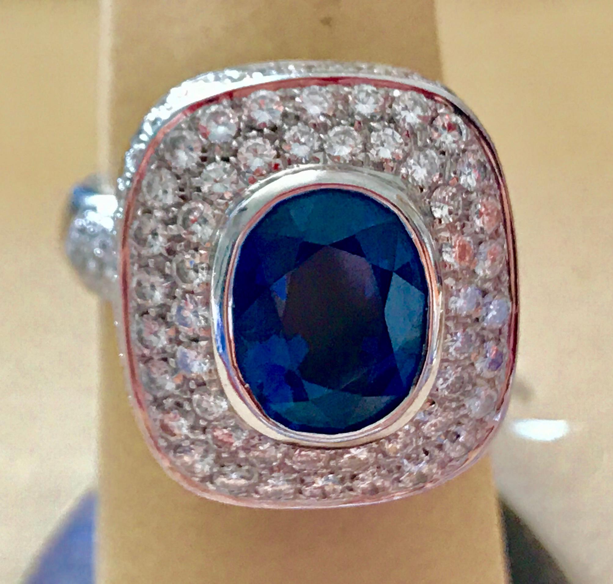 Approximately 4-5 Carat  Ceylon  Blue Sapphire & Diamond 18 Karat  White Gold Cocktail Ring
4-5 Carat of blue Sapphire. This is an estate piece and stone was not take out to weigh the actual weight . The estimated weight is my measurement only.
169