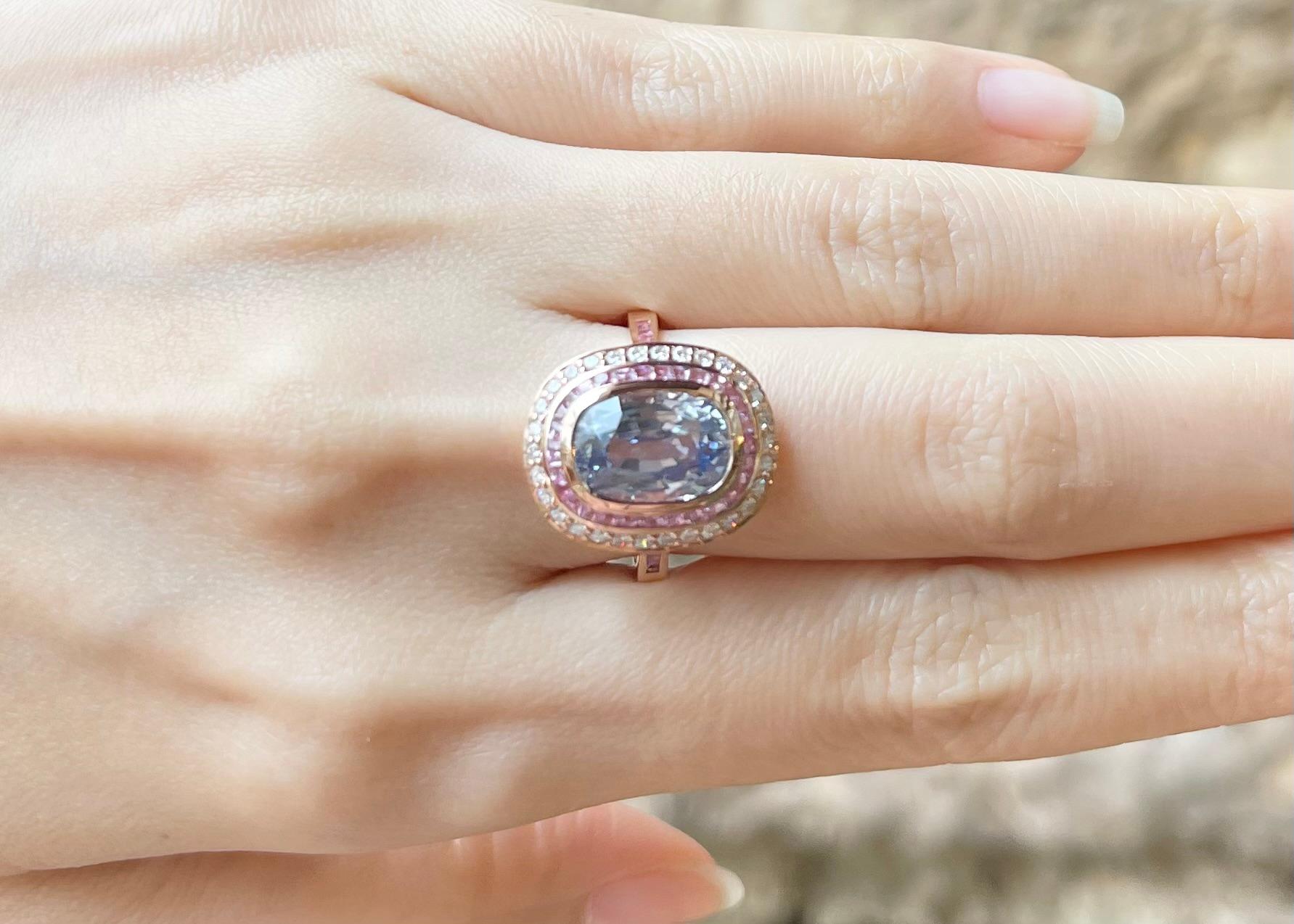 Contemporary Ceylon Blue Sapphire with Pink Sapphire and Diamond Ring set in 18K Rose Gold For Sale