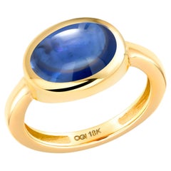 Ceylon Cabochon Sapphire 5.10 Carat 18 Karat Gold 0.41 Inch Wide Dome Ring