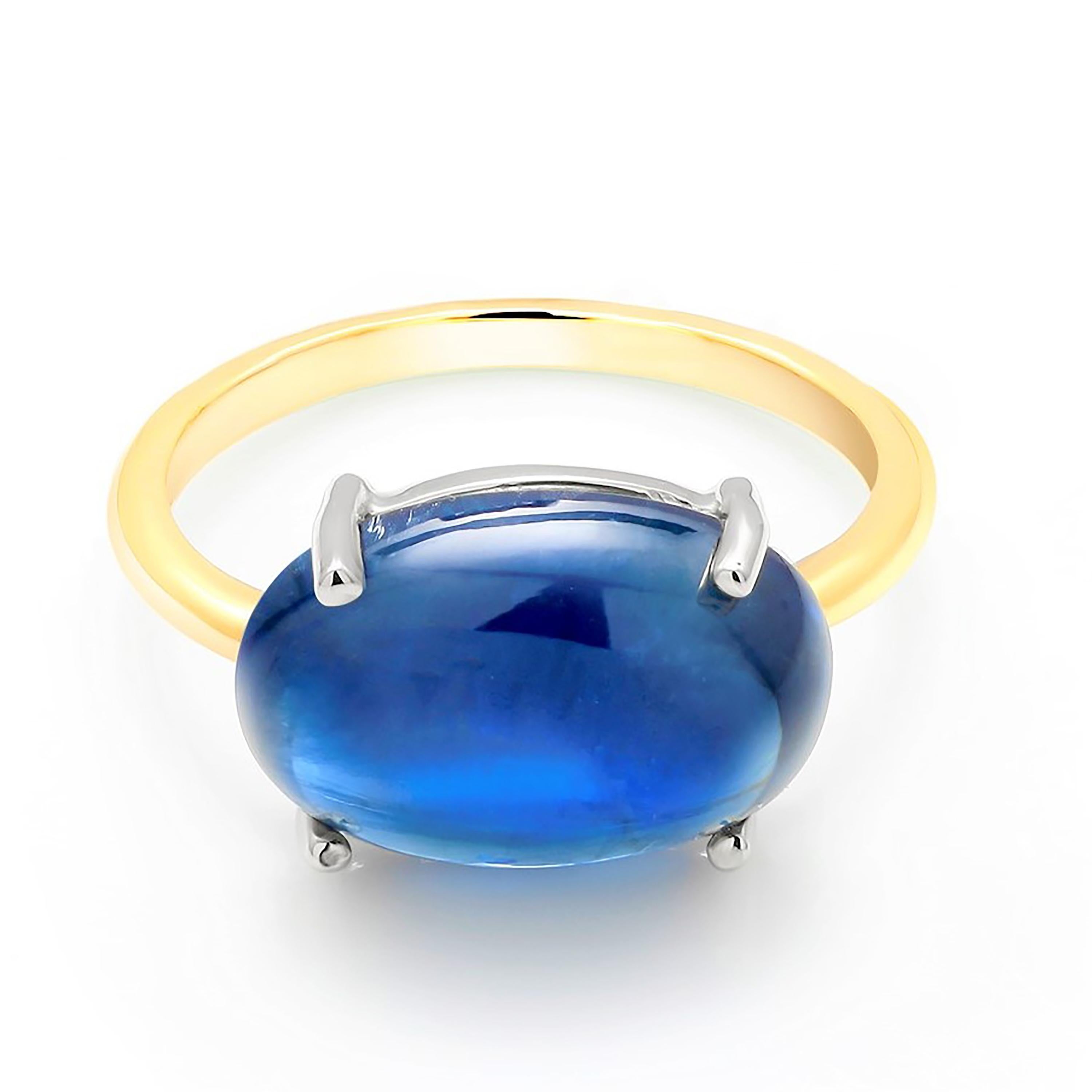 14 karats yellow and white gold cocktail ring
Ceylon cabochon sapphire weighing 5.30 carat
Sapphire measures 12x10
Ring finger size 6
New Ring  of a kind ring 
The ring can be resized
Made in the USA
Our design team select gemstones for their
