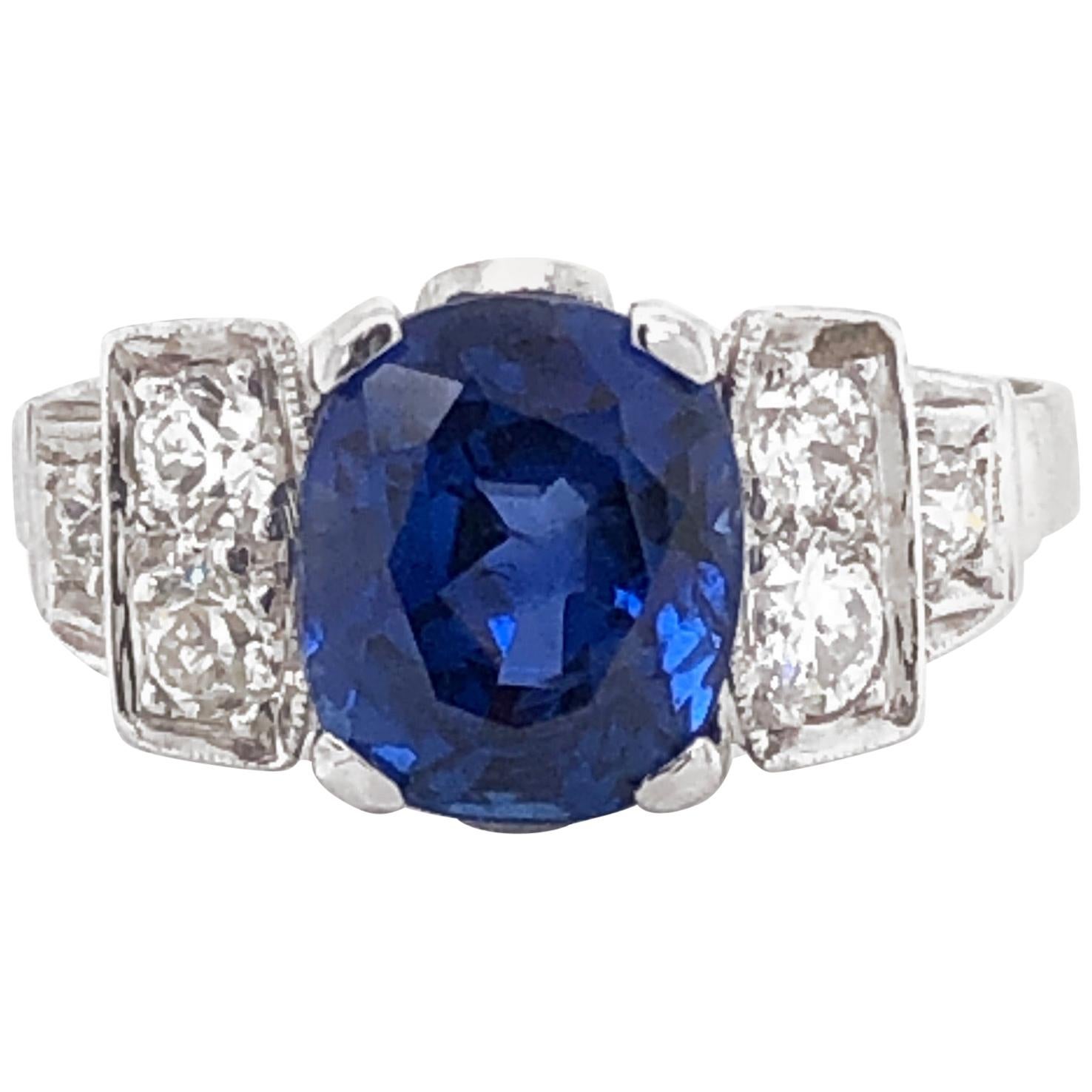 Ceylon Oval Cut Sapphire 4.27 Carat Diamond 0.42 Carat Total Platinum Ring For Sale