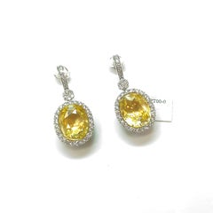 Ceylon Oval Cut Yellow Sapphire 35.34 Carat Total Diamond Platinum Ring
