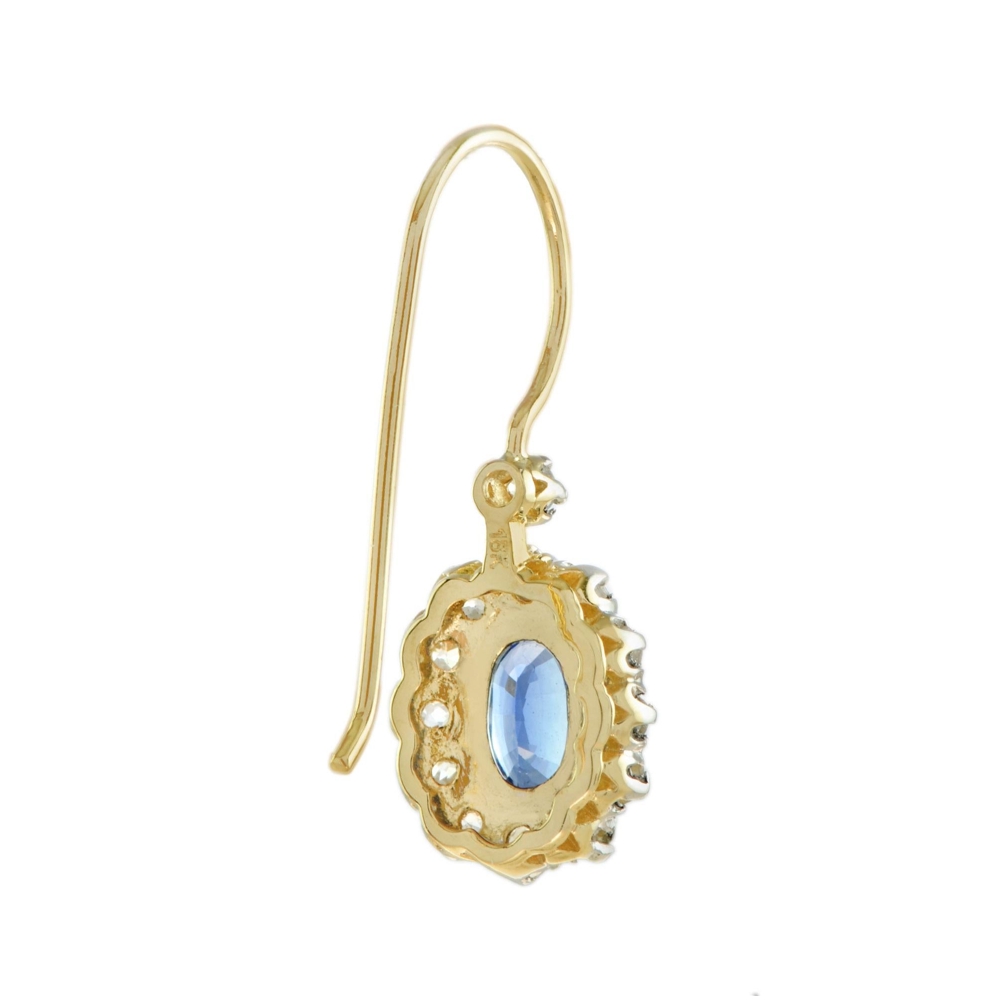 Art Déco Orecchini in oro 18 carati con zaffiro blu di Ceylon di forma ovale e diamante aureolato Stile antico in vendita