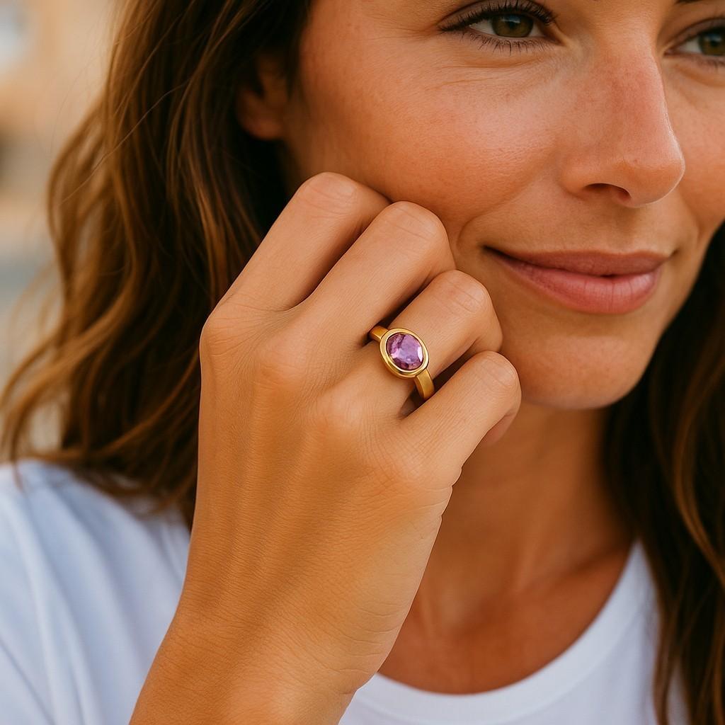 Introducing our exquisite Ceylon Pink Sapphire Cocktail Ring, a captivating masterpiece that effortlessly combines timeless elegance with contemporary style. This stunning ring features a dazzling 1.10-carat Ceylon Pink Sapphire, known for its rare