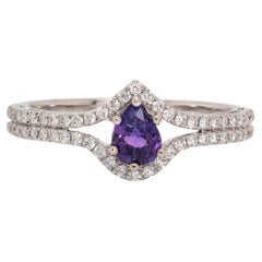 Anello con zaffiro viola di Ceylon e accenti di diamanti estratti dalla terra in oro bianco 14 carati