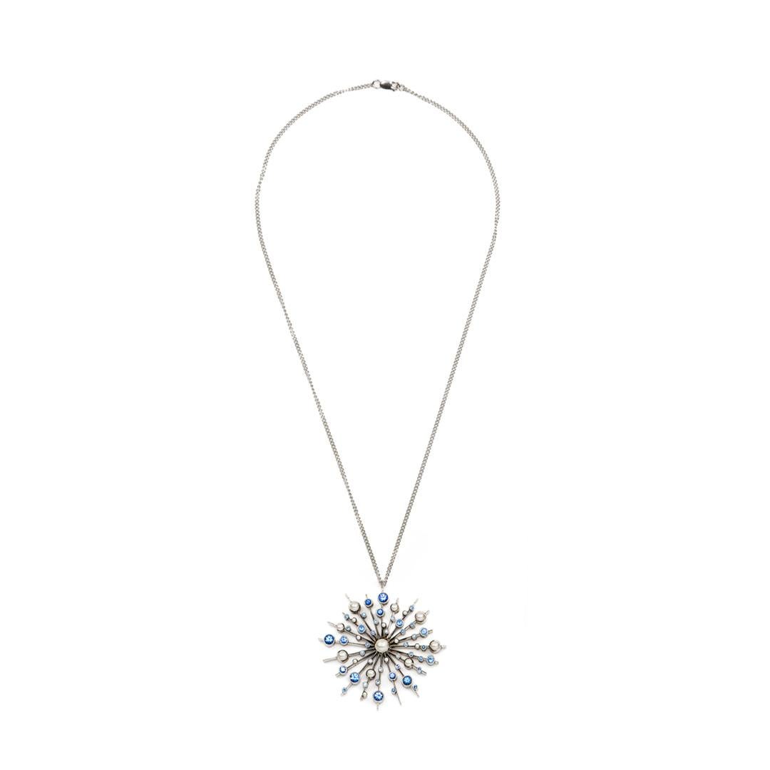 Part of the 'Soleil' collection by Natalie Barney, this pendant necklace features 40 Ceylon Blue Sapphires with a total weight of 1.19 carats. This pendant comes complete with a 45cm fine trace chain.

Made in 9 carat white gold.  Please request the