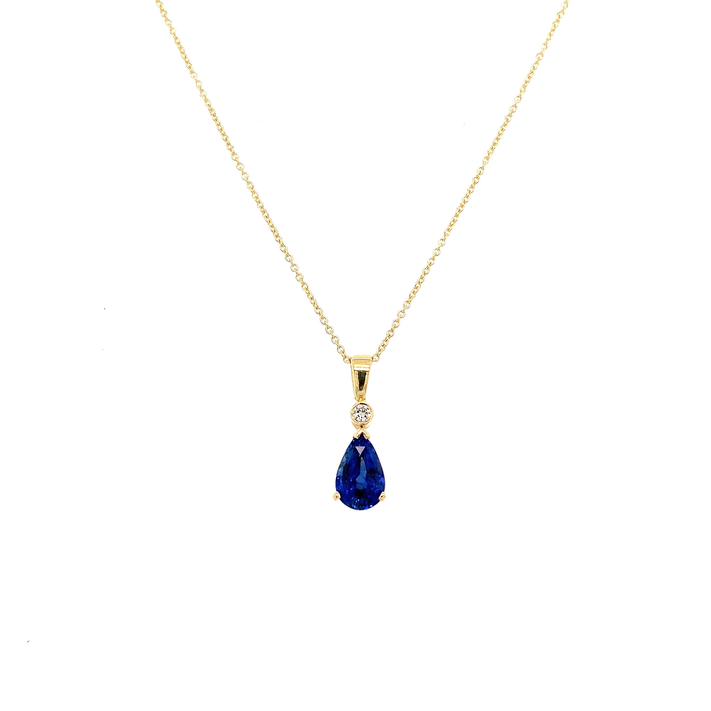 Ceylon sapphire and diamond drop pendant necklace 18k yellow gold
Blue Ceylon sapphire pear shaped natural gemstone weight approximately 1.10ct 
Round brilliant diamond F colour VS1 clarity total weight 0.10ct
Chain length 18 inches hallmarked
Box