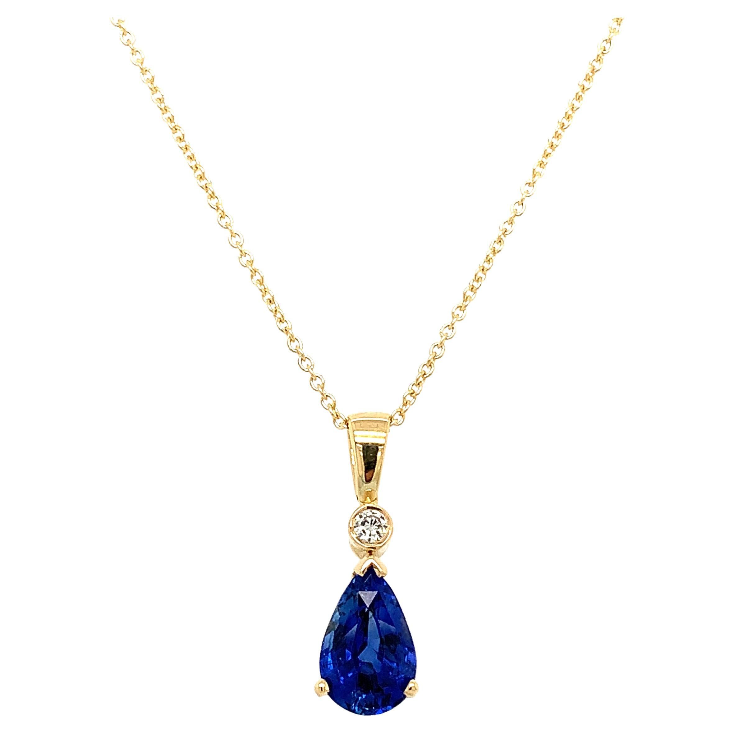 Ceylon sapphire and diamond drop pendant necklace 18k yellow gold