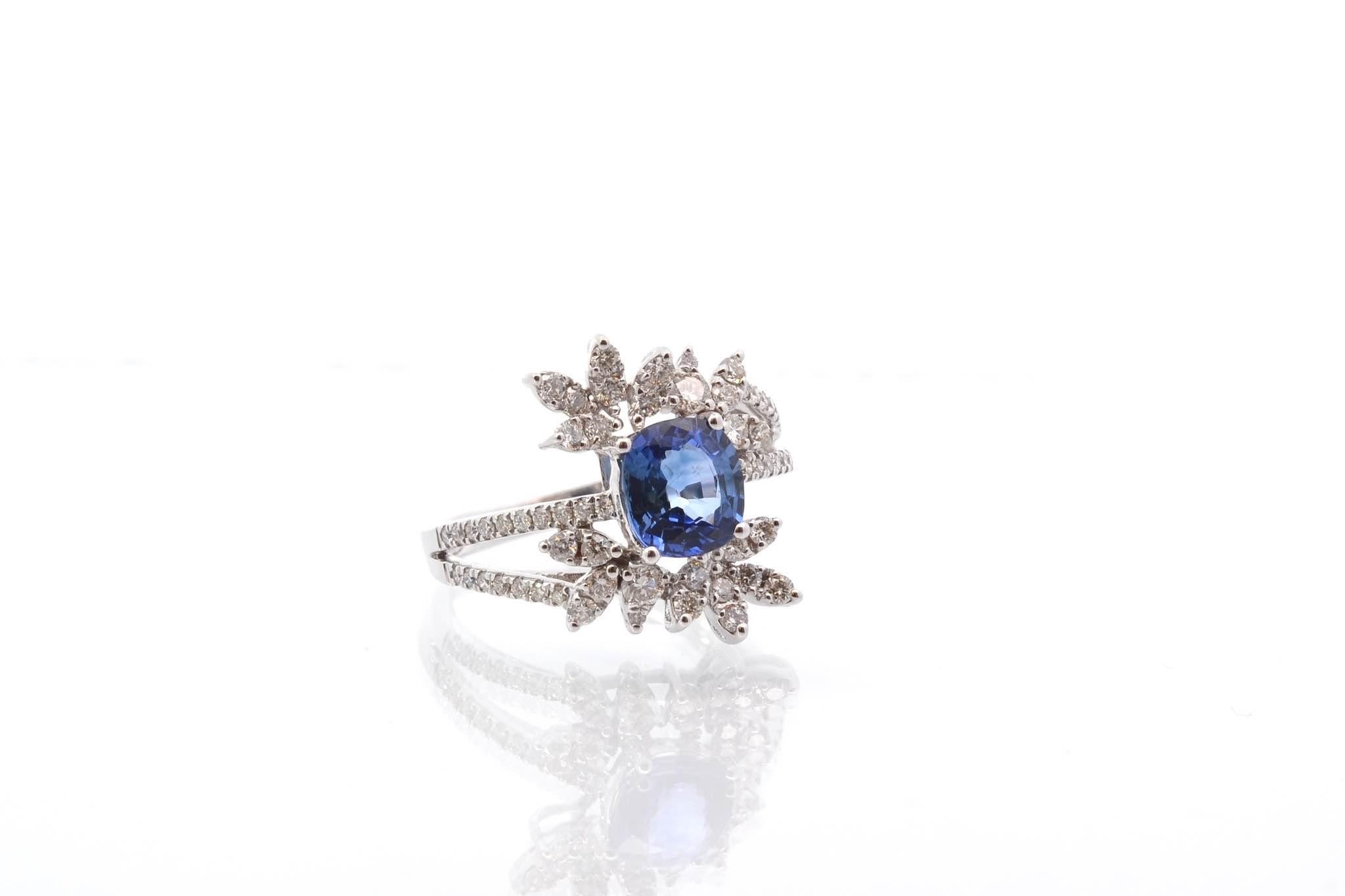 Oval Cut Ceylon sapphire and diamond ring in 18k white gold For Sale