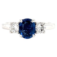 Ceylon sapphire and diamonds trilogy engagement ring 18k white gold