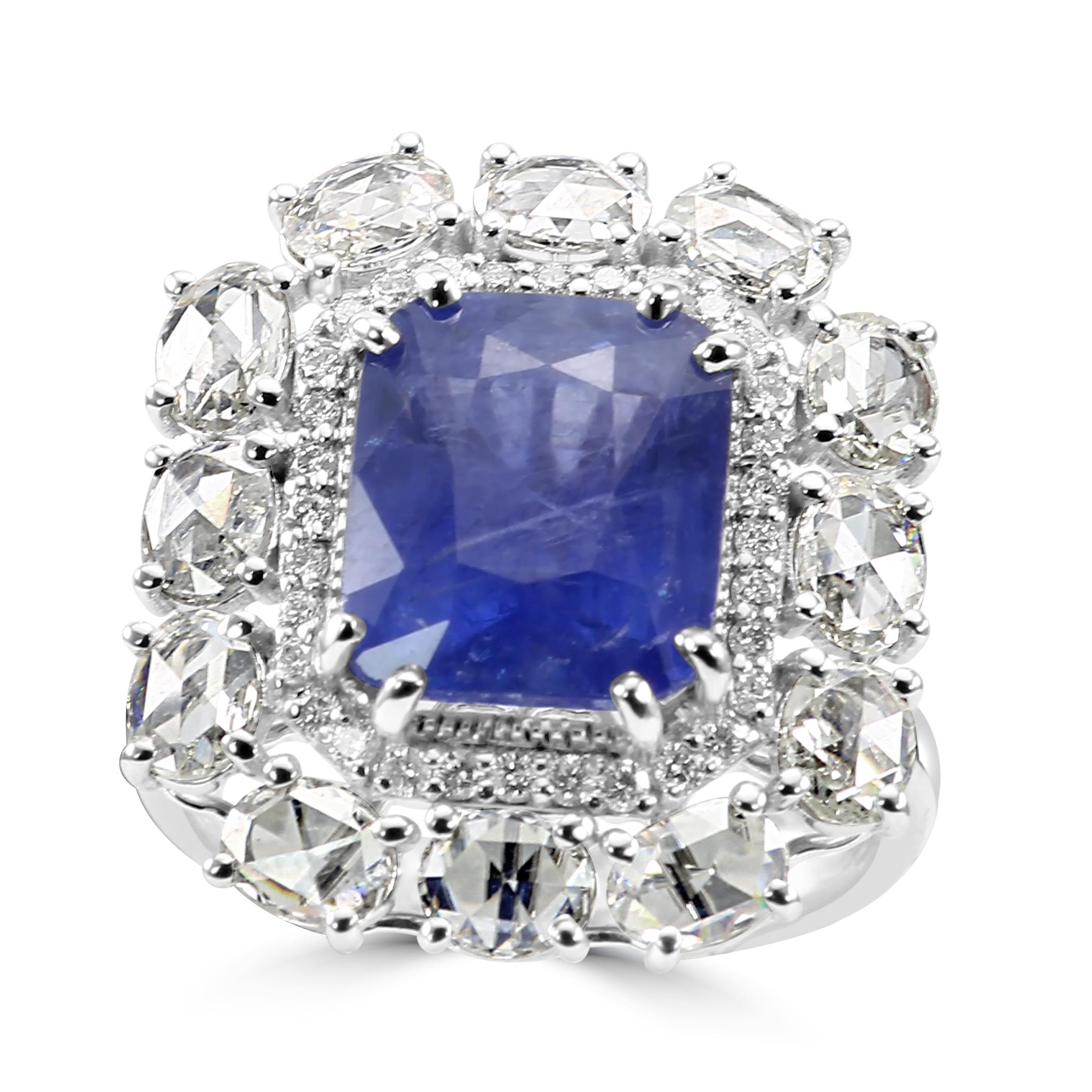 Step into the realm of unparalleled elegance with our stunning Ceylon Sapphire double halo ring. 

At the heart of this majestic ring is the Ceylon Sapphire, known for its enchanting blue hue and cushion-cut shape. Weighing a total of 6.06 carats,