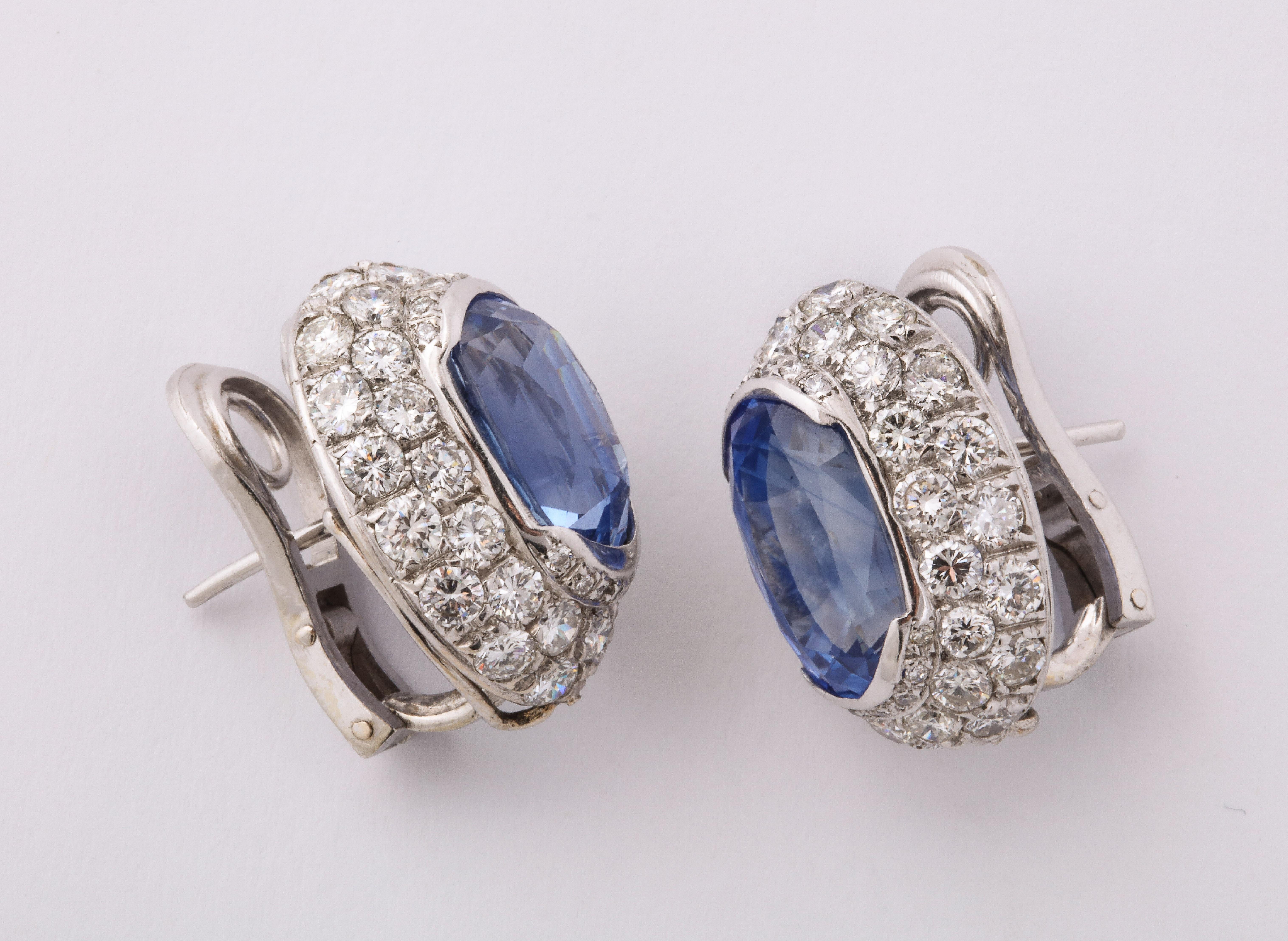 Ceylon Sapphire Diamond Platinum Earrings featuring 2 oval sapphires of approximately 6 carats total weight and 88 fine white full cut diamonds set in platinum. Clip on back allows for addition of a drop if desired.  The earrings are unmarked but