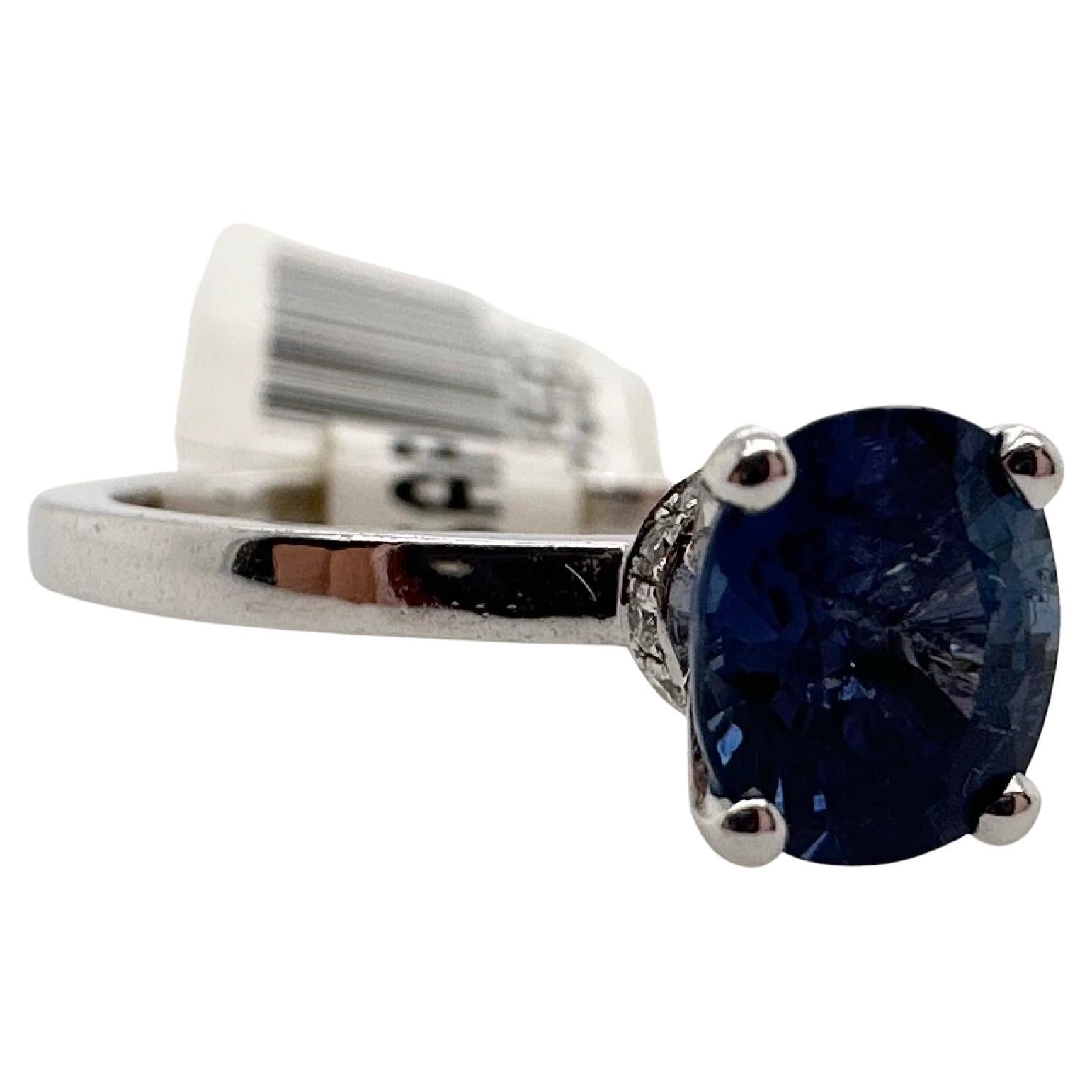 Ceylon sapphire ring with hidden diamonds set under the gallery. The ring is made in 14KT white gold, very classical engagement ring.

Metal Type: 14KT

Natural Sapphire(s):
Color: Blue
Cut:Cushion
Carat: 1.09ct
Clarity: Moderately Included

Natural