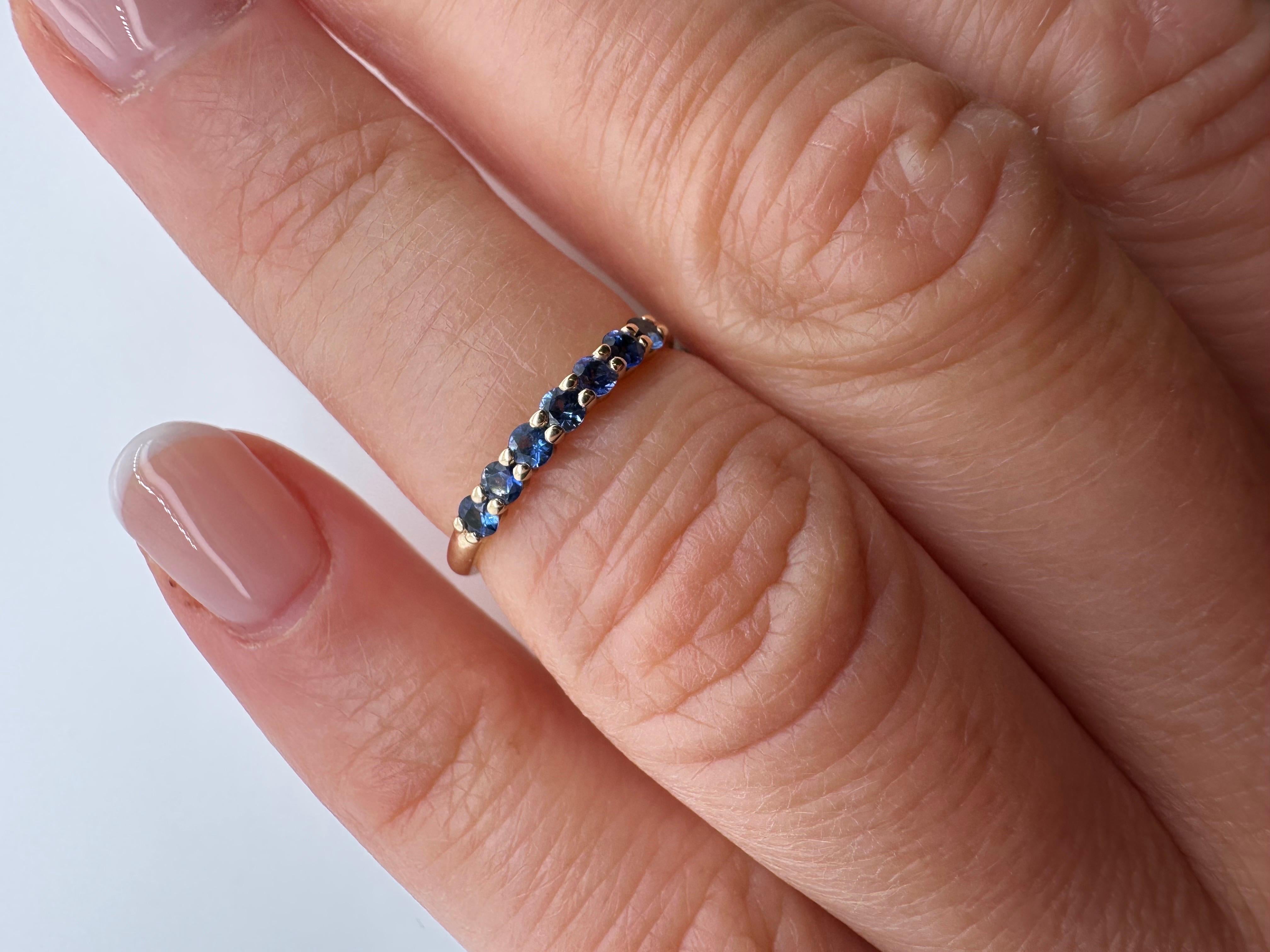 Such a cute wedding band made with ceylon sapphires in 14KT yellow gold.

Metal Type: 14KT

Natural Sapphire(s):
Color: Blue
Cut:Round
Carat: 0.29ct
Clarity: Slightly Included


Certificate of authenticity comes with purchase

ABOUT US
We are a