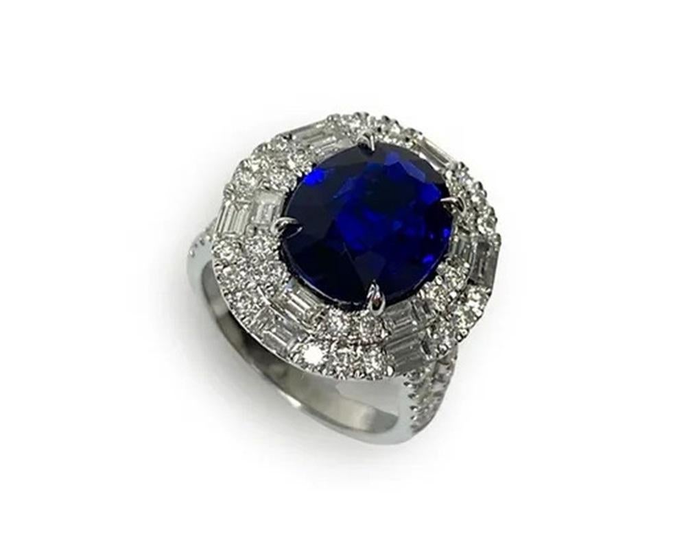 Sapphire Weight: 4.47 cts, Sapphire Measurements: 12.2 x 9.6 mm, Diamond Weight: 1.98 cts, 18K White Gold, Shape: Oval, Color: Royal Blue, Hardness: 9, Origin: Ceylon/Sri Lanka, Birthstone: September